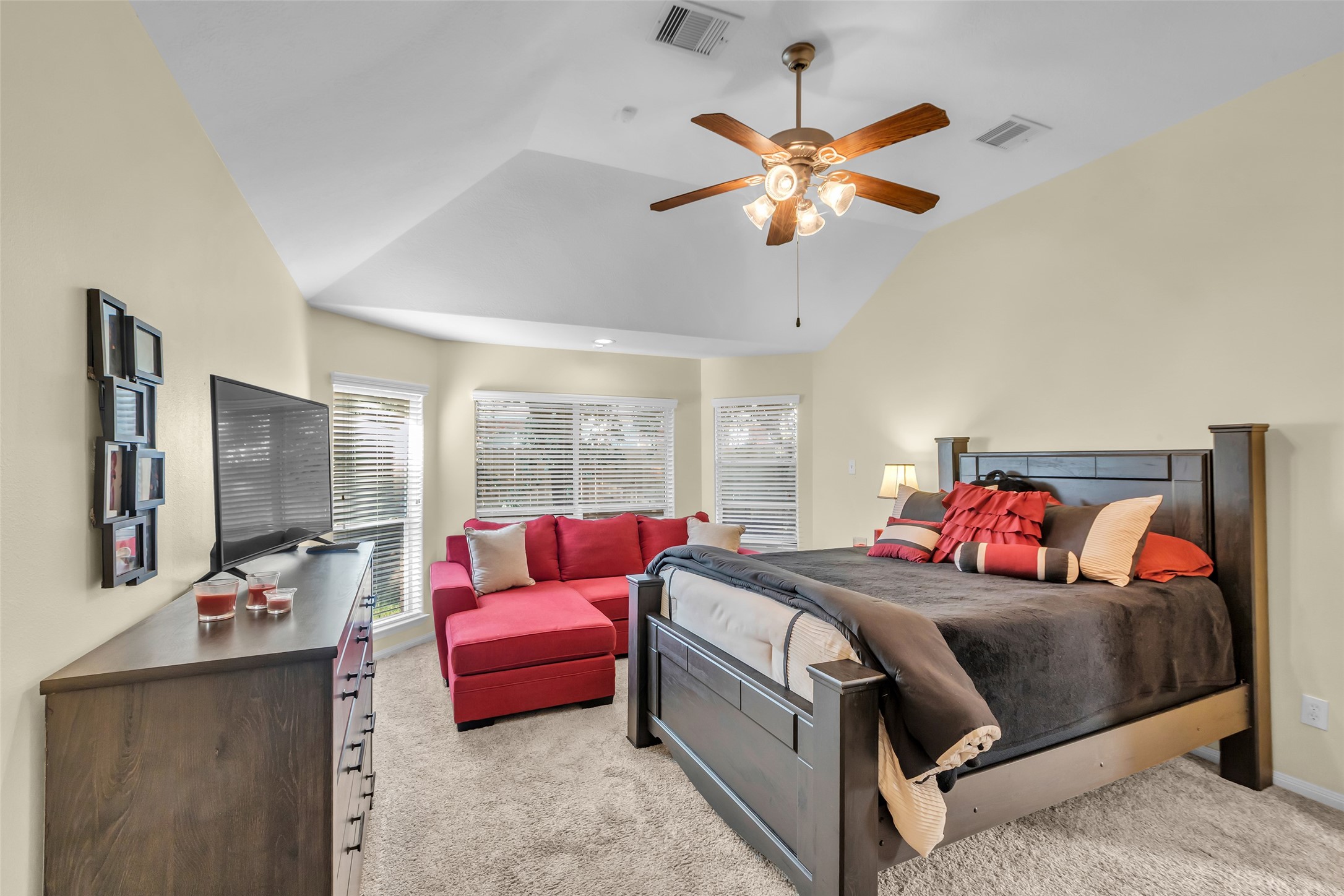 6311 Stone Hill Road Spring, TX 77389 - Photo 14 of 26 a bedroom with a bed and a flat screen tv