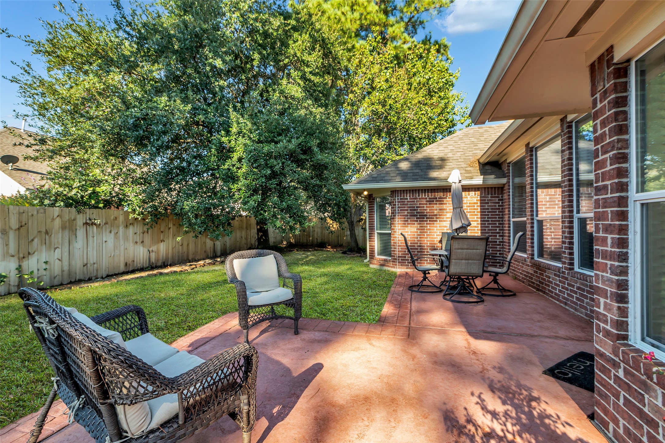 6311 Stone Hill Road Spring, TX 77389 - Photo 21 of 26 a view of backyard of house with seating space