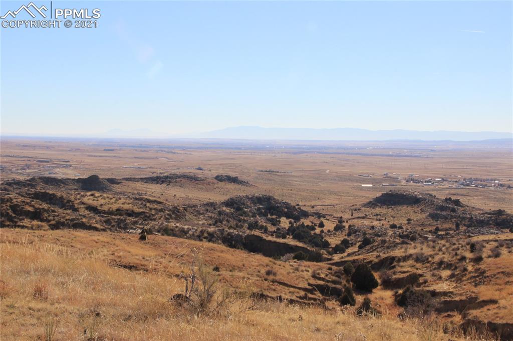 2907 Solberg Court Peyton, CO 80831 - Photo 11 of 14 an aerial view of residential houses with city view
