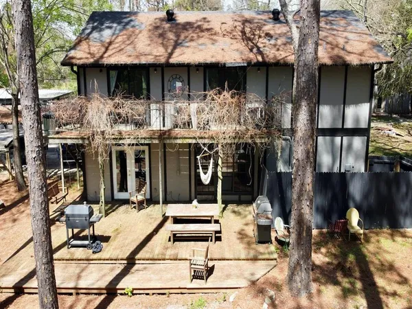 a kitchen with a sink a stove cabinets and refrigerator
