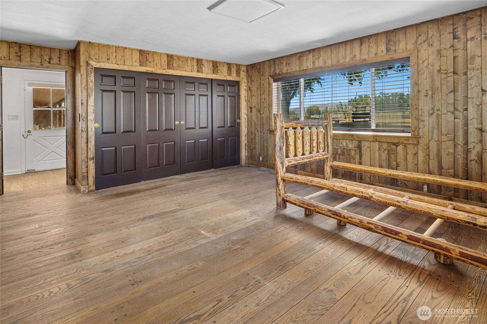 4530 Weaver Road Ellensburg, WA 98926 - Photo 16 of 39 a view of an empty room with wooden floor and a window