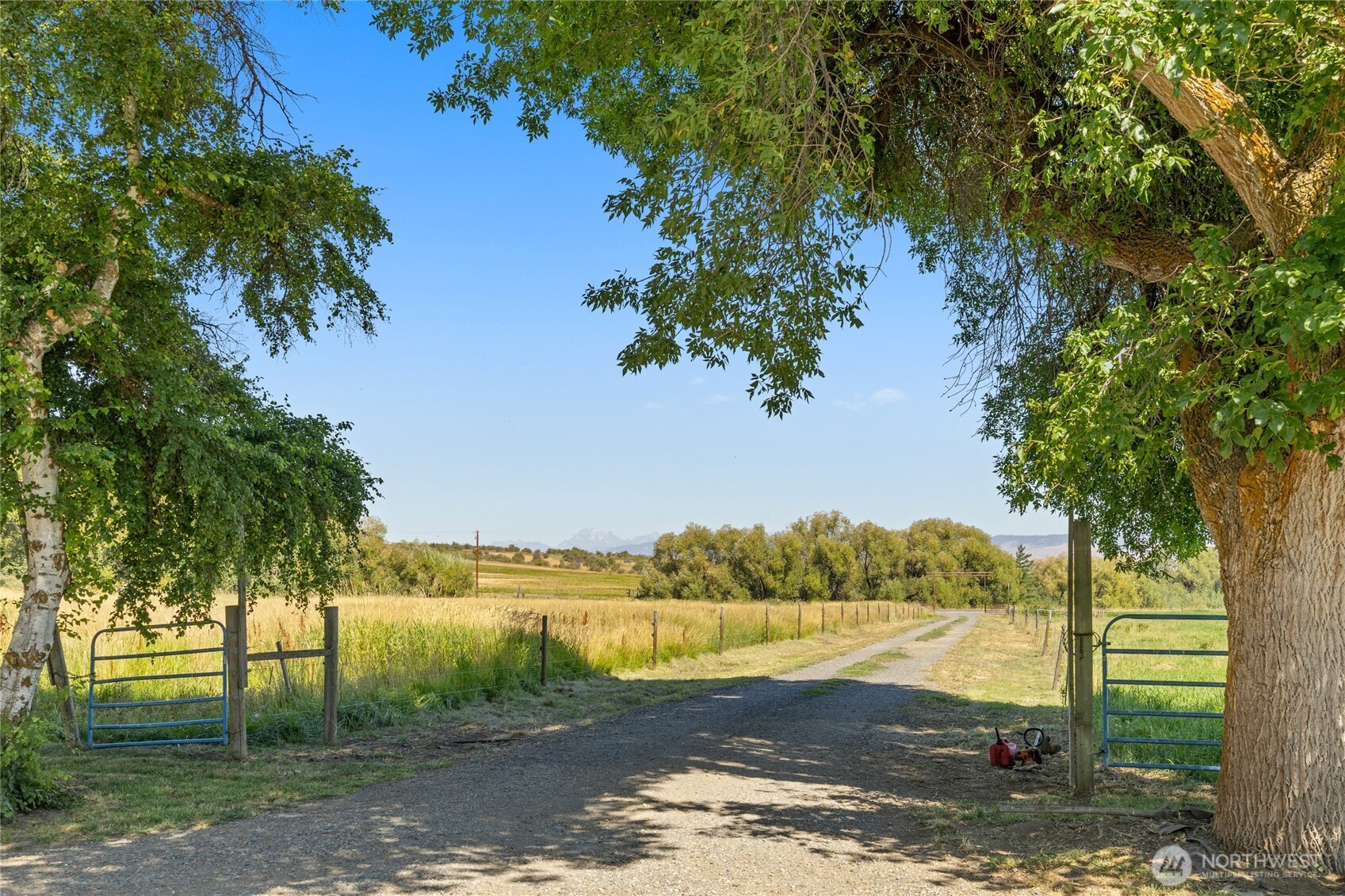 4530 Weaver Road Ellensburg, WA 98926 - Photo 32 of 39 a view of a lake from a yard