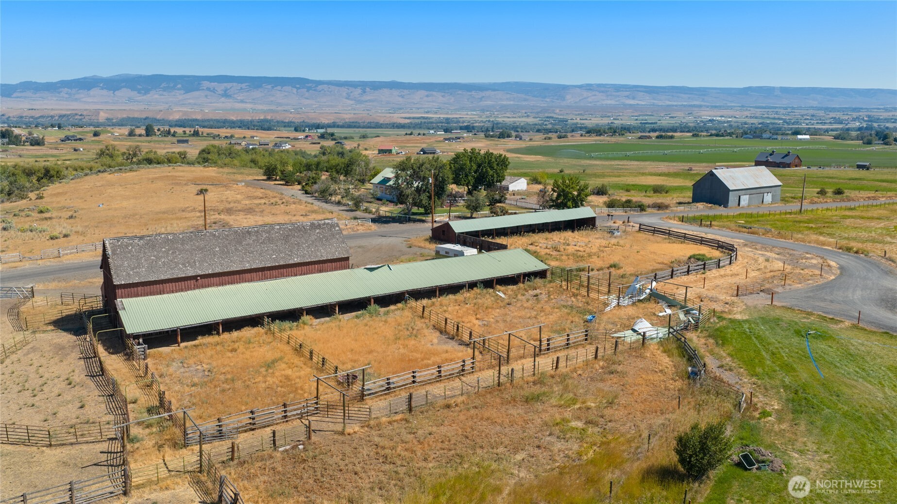4530 Weaver Road Ellensburg, WA 98926 - Photo 35 of 39 a view of a swimming pool and an ocean view