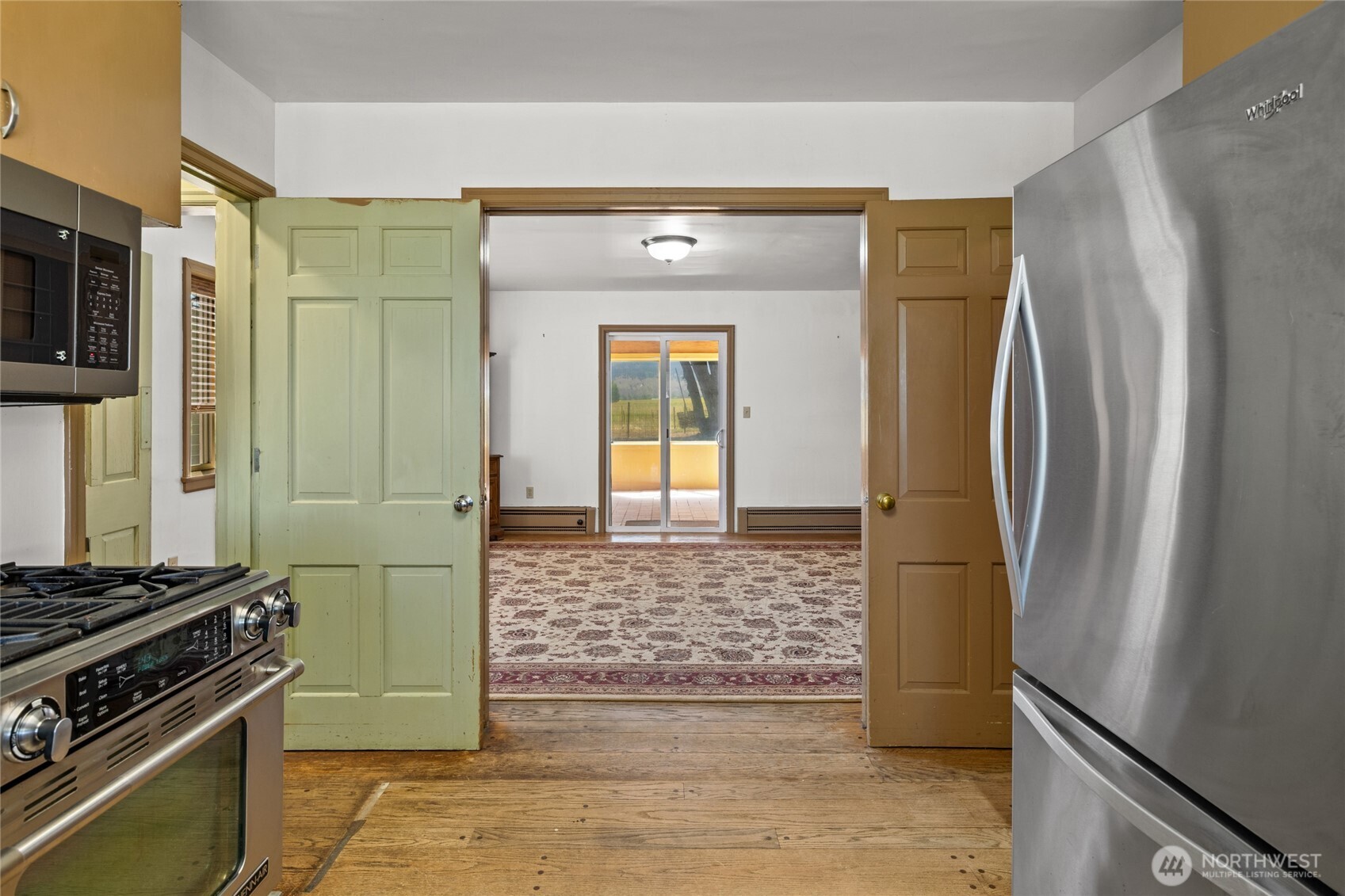 4530 Weaver Road Ellensburg, WA 98926 - Photo 9 of 39 a kitchen with stainless steel appliances granite countertop a refrigerator and a stove