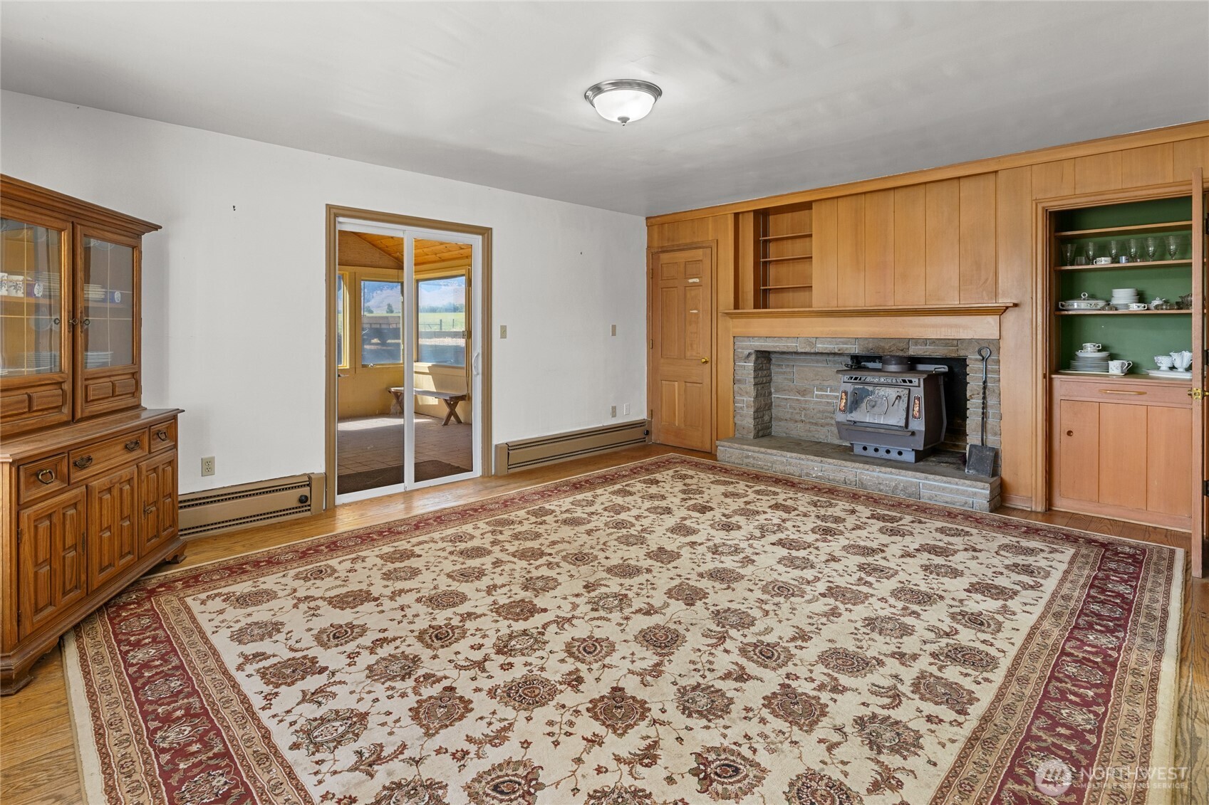 4530 Weaver Road Ellensburg, WA 98926 - Photo 10 of 39 a bedroom with a bed and a fireplace