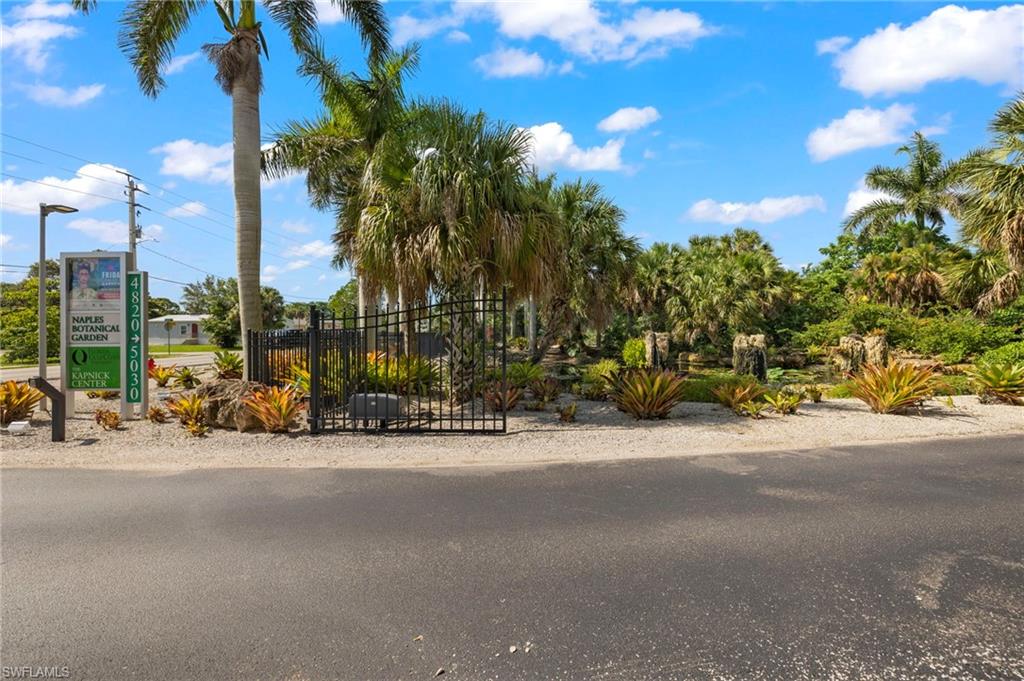4718 Normandy Drive Naples, FL 34112 - Photo 13 of 14 a view of a street with a building in the background