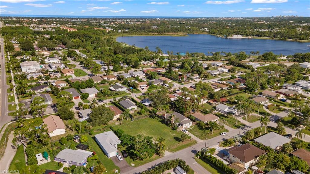4718 Normandy Drive Naples, FL 34112 - Photo 5 of 14 an aerial view of residential houses with outdoor space
