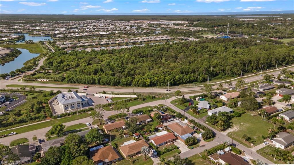 4718 Normandy Drive Naples, FL 34112 - Photo 6 of 14 an aerial view of a city