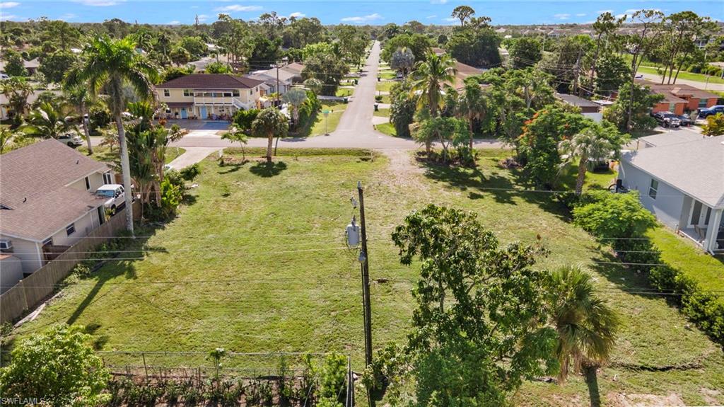 4718 Normandy Drive Naples, FL 34112 - Photo 7 of 14 a view of residential houses with yard