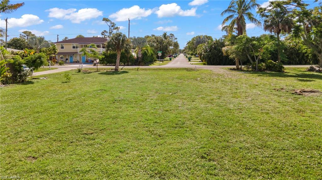 4718 Normandy Drive Naples, FL 34112 - Photo 8 of 14 a view of an outdoor space and swimming pool