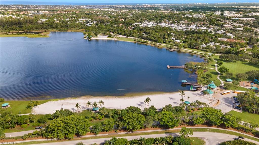 4718 Normandy Drive Naples, FL 34112 - Photo 9 of 14 an aerial view of ocean and residential houses with outdoor space