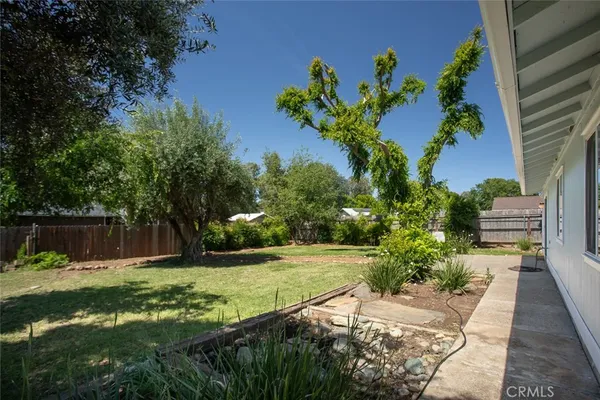 a view of a garden with a fountain