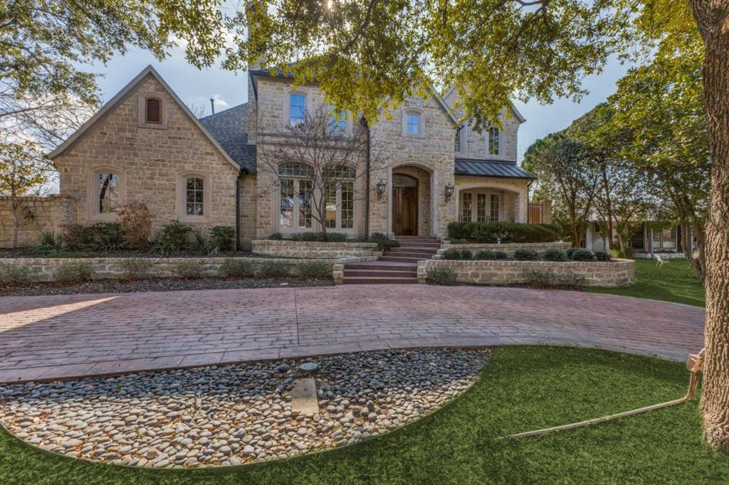 6416 Dykes Way Dallas, TX 75230 - Photo 2 of 37 a front view of a house with garden