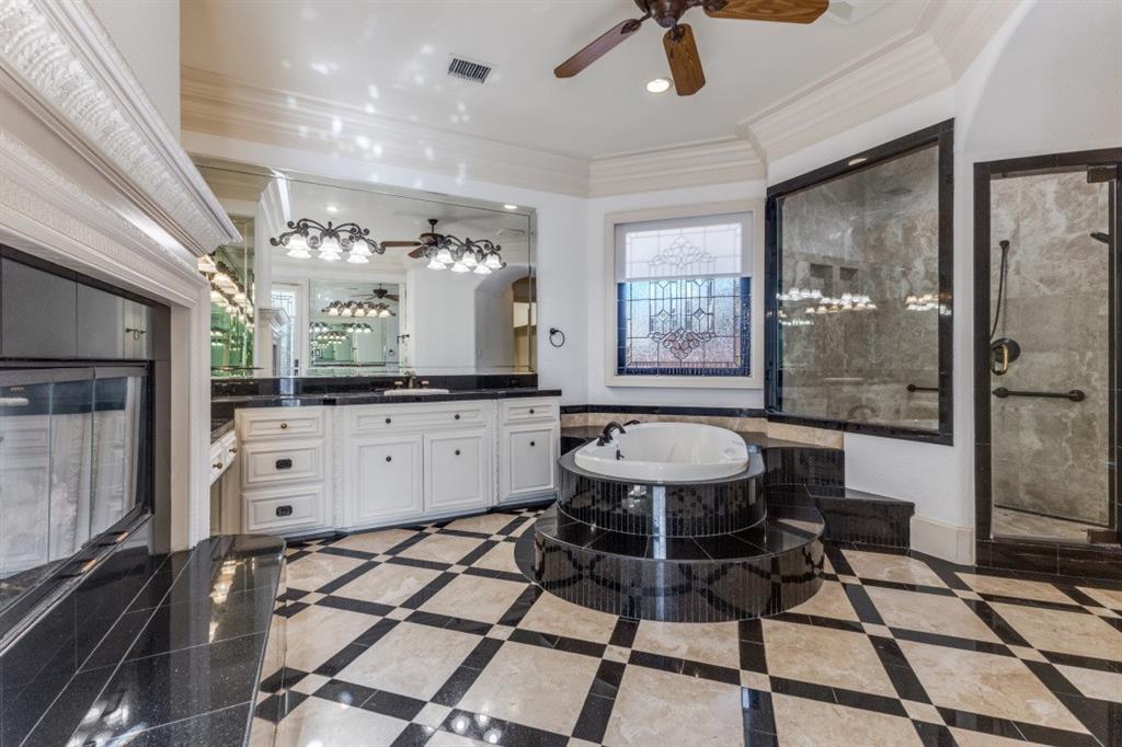 6416 Dykes Way Dallas, TX 75230 - Photo 25 of 37 a large white kitchen with a large window
