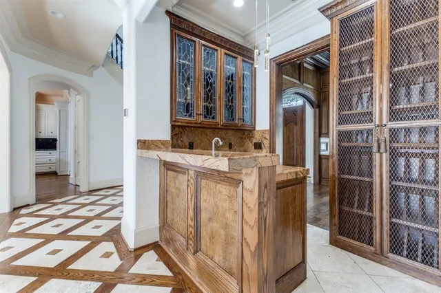 a bathroom with a sink a mirror and shower