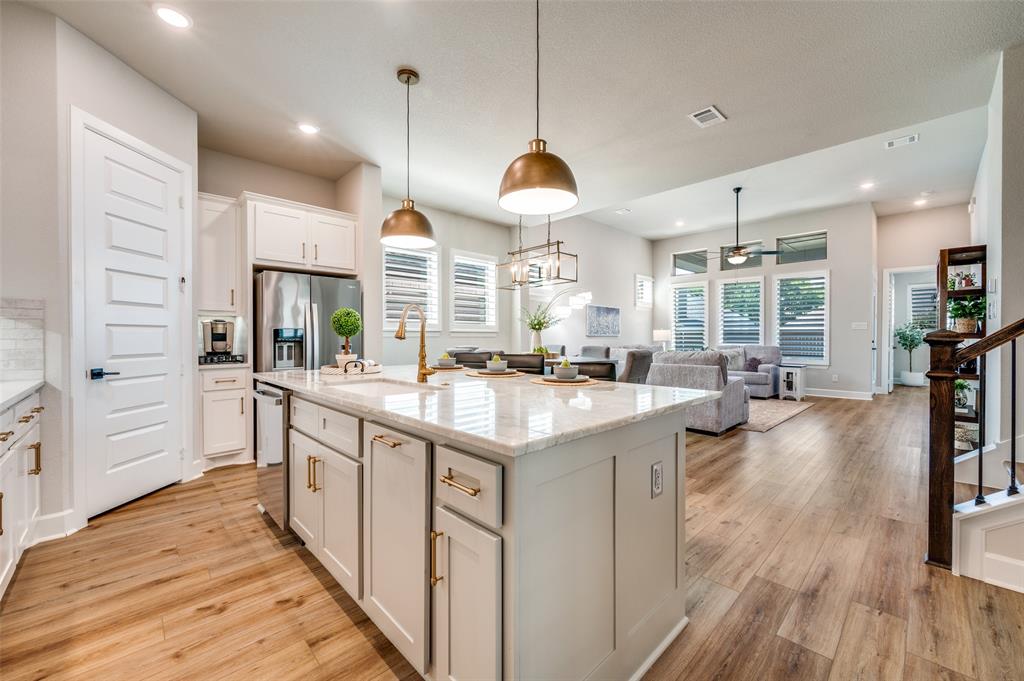 6333 Hedgecoxe Road The Colony, TX 75056 - Photo 5 of 25 View of kitchen and kitchen island