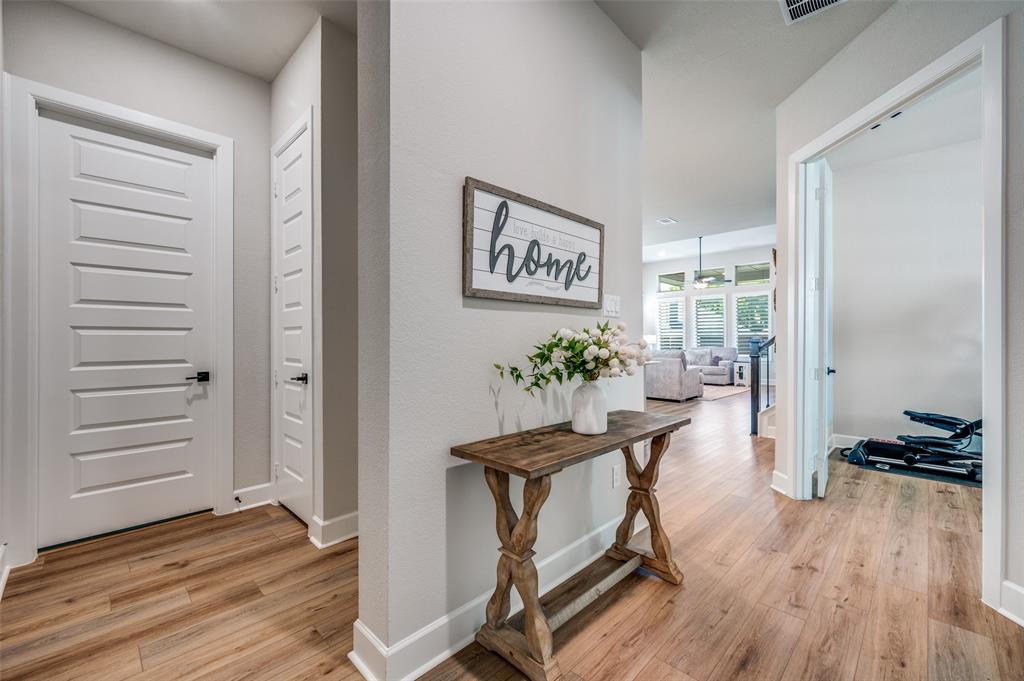 6333 Hedgecoxe Road The Colony, TX 75056 - Photo 6 of 25 View of Entry that leads to the kitchen, dining and living area. Door leads to Laundry area.