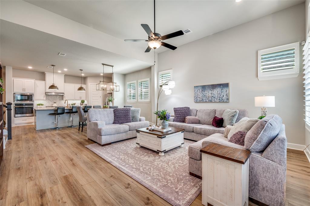 6333 Hedgecoxe Road The Colony, TX 75056 - Photo 8 of 25 Second view of living area looking into dining and kitchen area