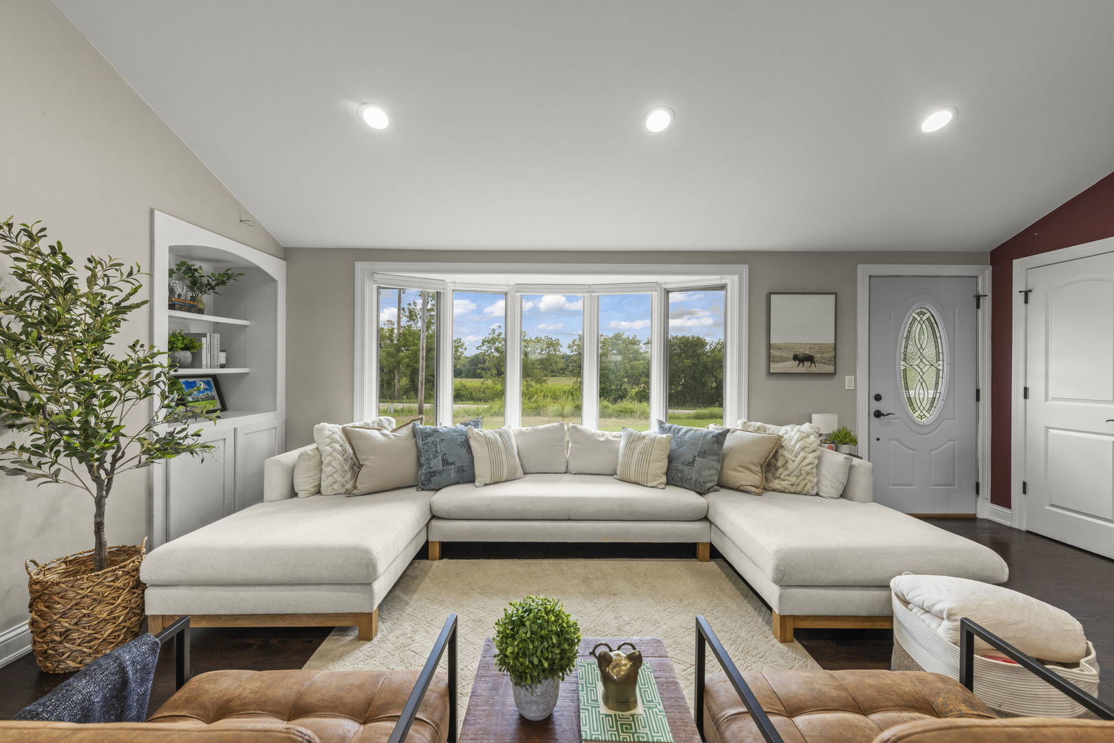 10N862 Muirhead Road Elgin, IL 60124 - Photo 12 of 47 a living room with furniture and a large window