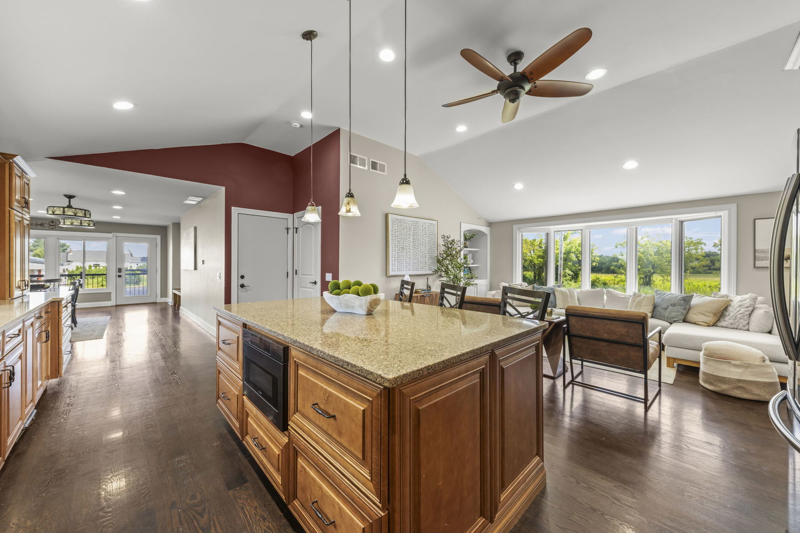 10N862 Muirhead Road Elgin, IL 60124 - Photo 17 of 47 a living room with stainless steel appliances kitchen island furniture and a table