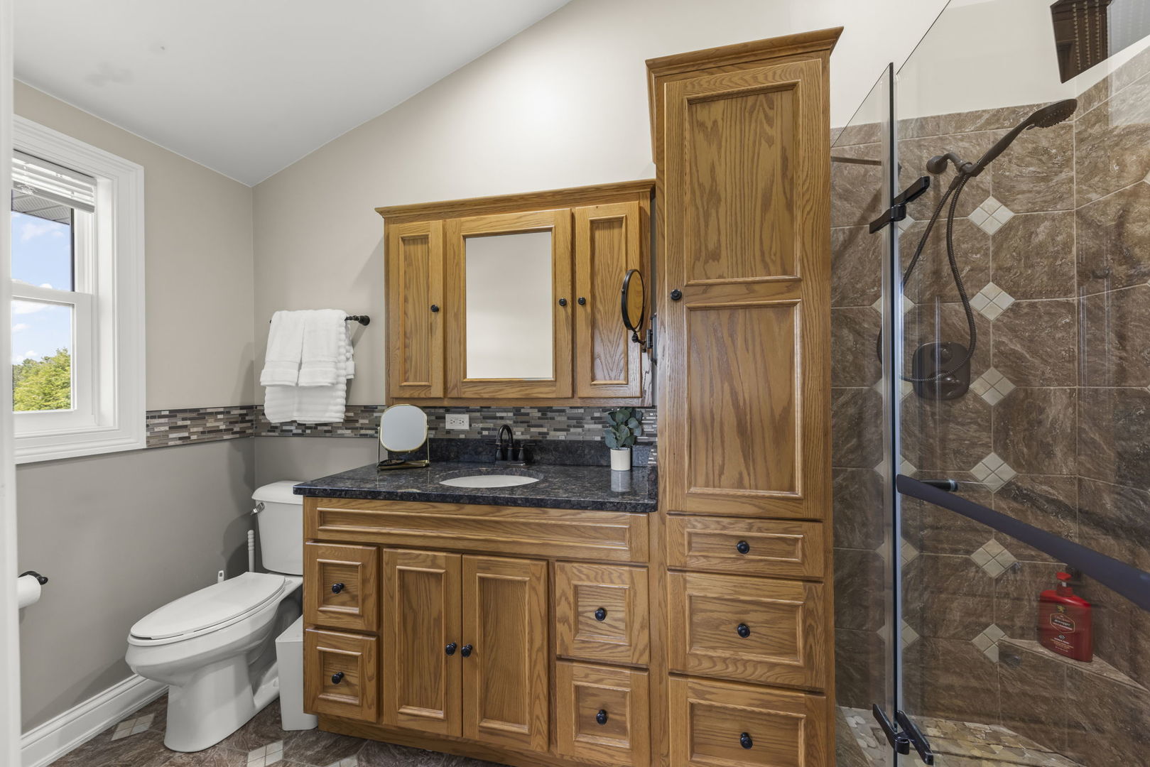 10N862 Muirhead Road Elgin, IL 60124 - Photo 22 of 47 a bathroom with a granite countertop sink toilet and shower