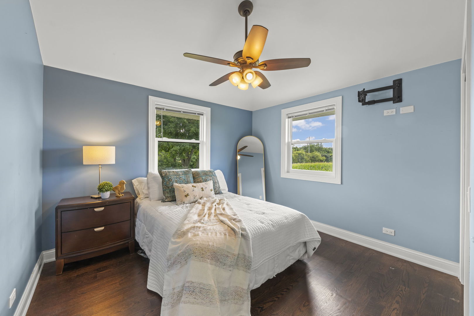 10N862 Muirhead Road Elgin, IL 60124 - Photo 24 of 47 a bed sitting in a bedroom next to a window