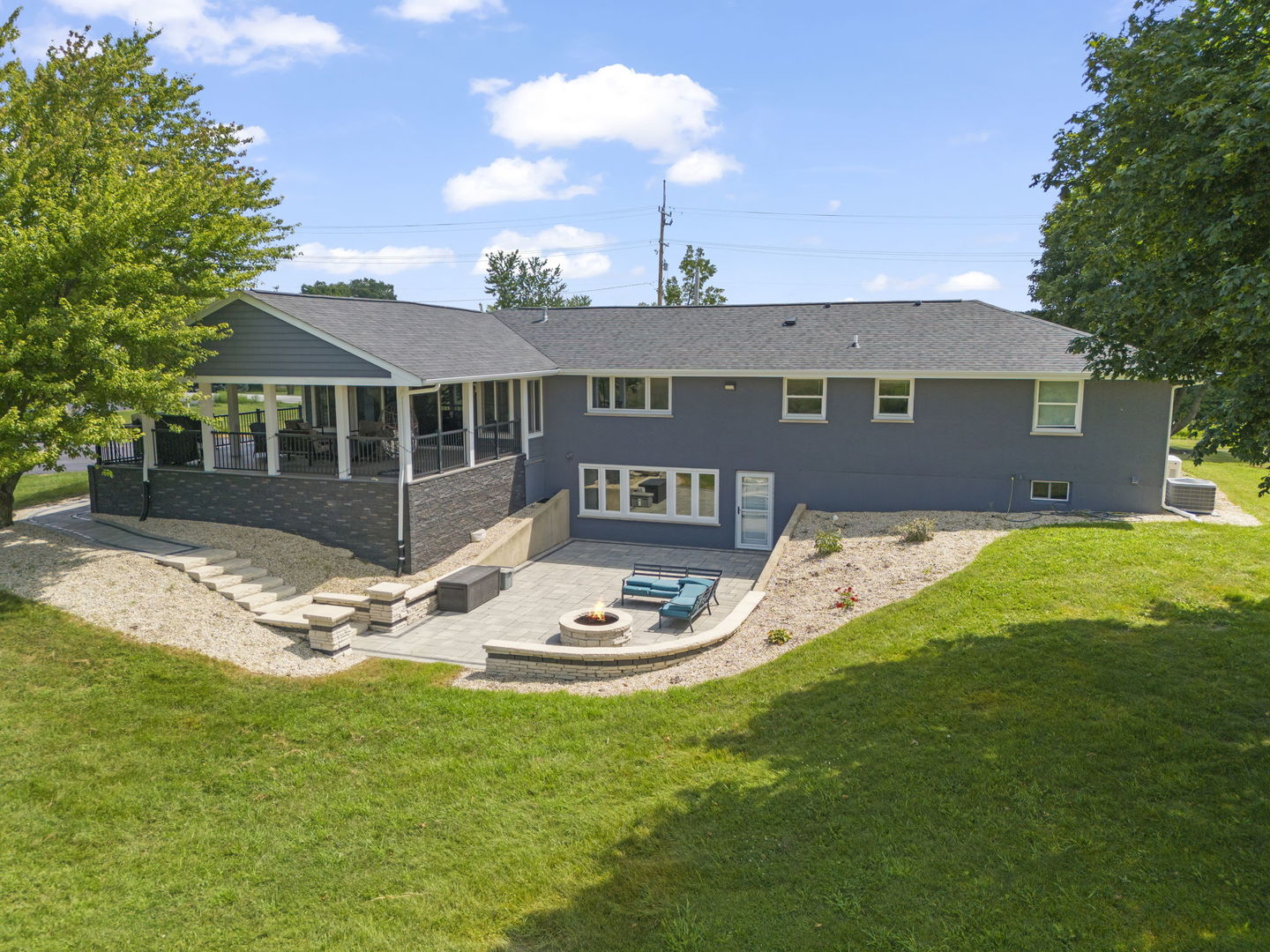 10N862 Muirhead Road Elgin, IL 60124 - Photo 32 of 47 a view of a house with a yard and sitting area