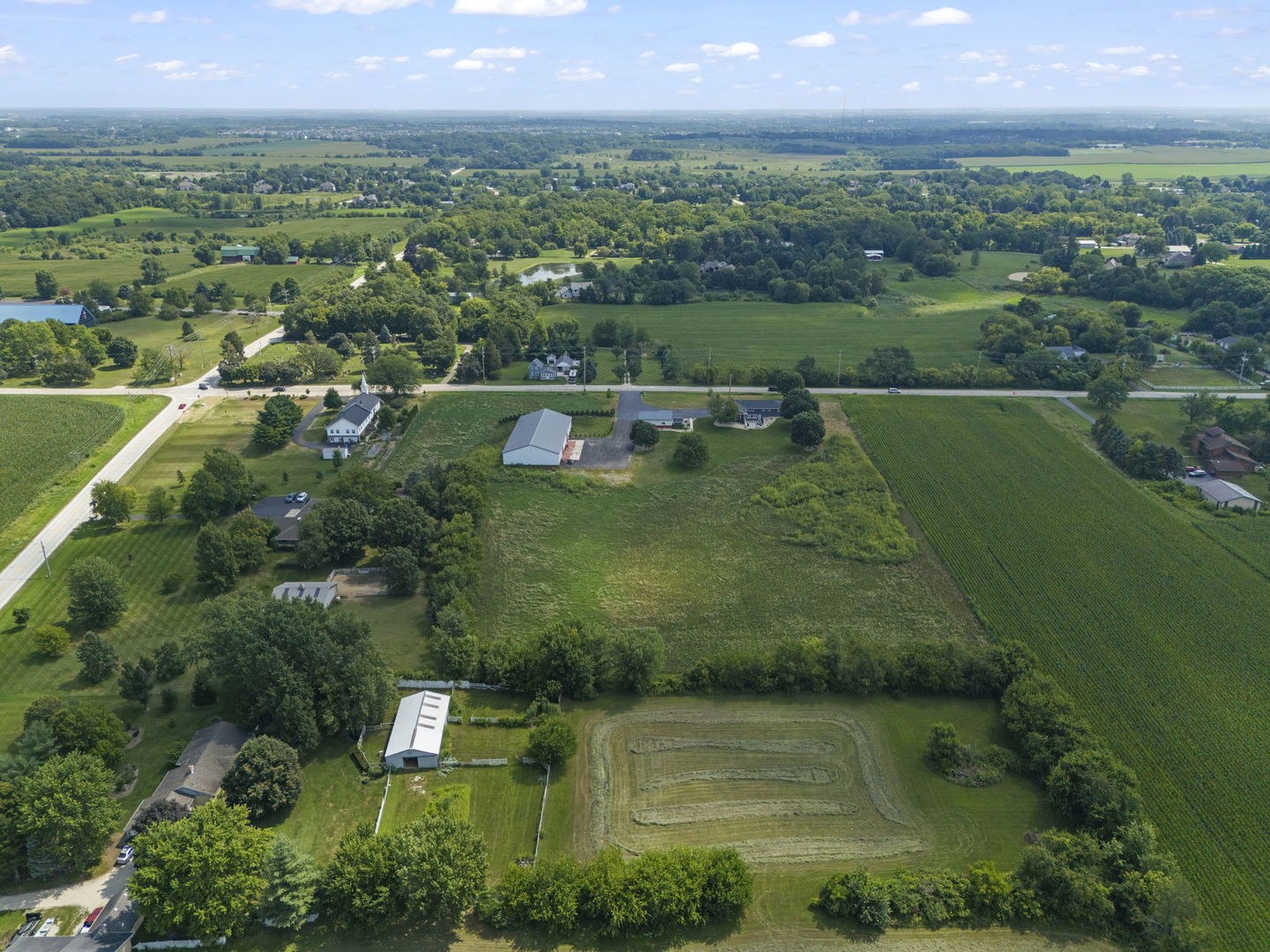 10N862 Muirhead Road Elgin, IL 60124 - Photo 37 of 47 an aerial view of a house with a yard