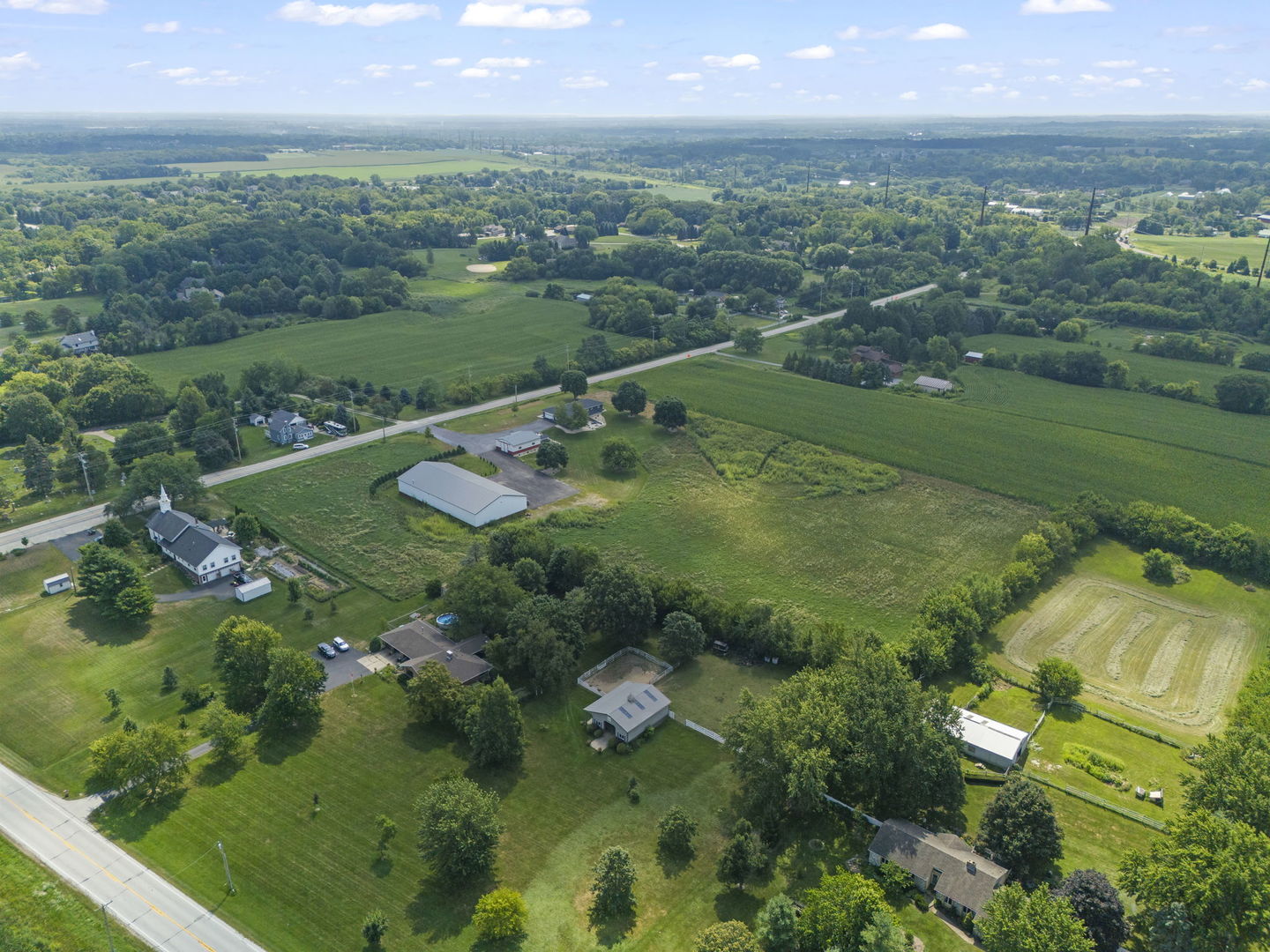 10N862 Muirhead Road Elgin, IL 60124 - Photo 38 of 47 an aerial view of residential houses with outdoor space and trees