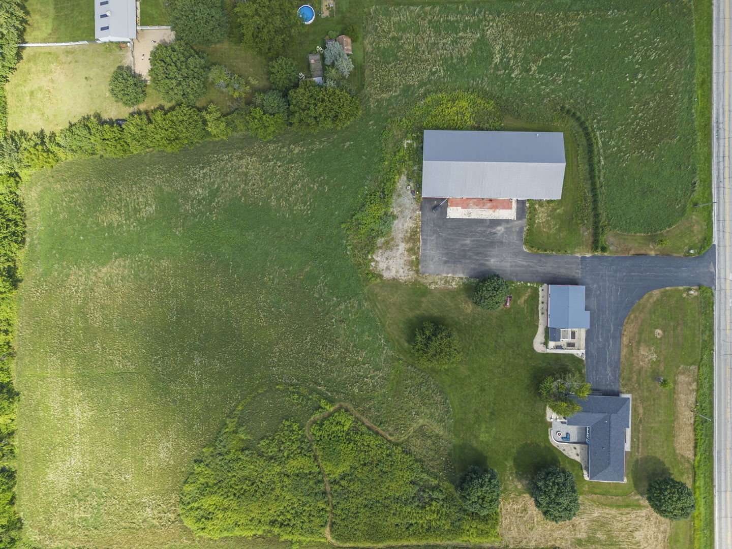 10N862 Muirhead Road Elgin, IL 60124 - Photo 43 of 47 an aerial view of a house with a yard
