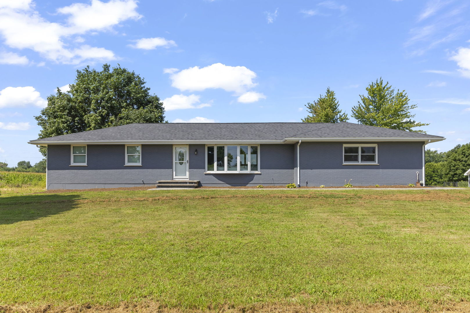 10N862 Muirhead Road Elgin, IL 60124 - Photo 10 of 47 a view of a house with a swimming pool