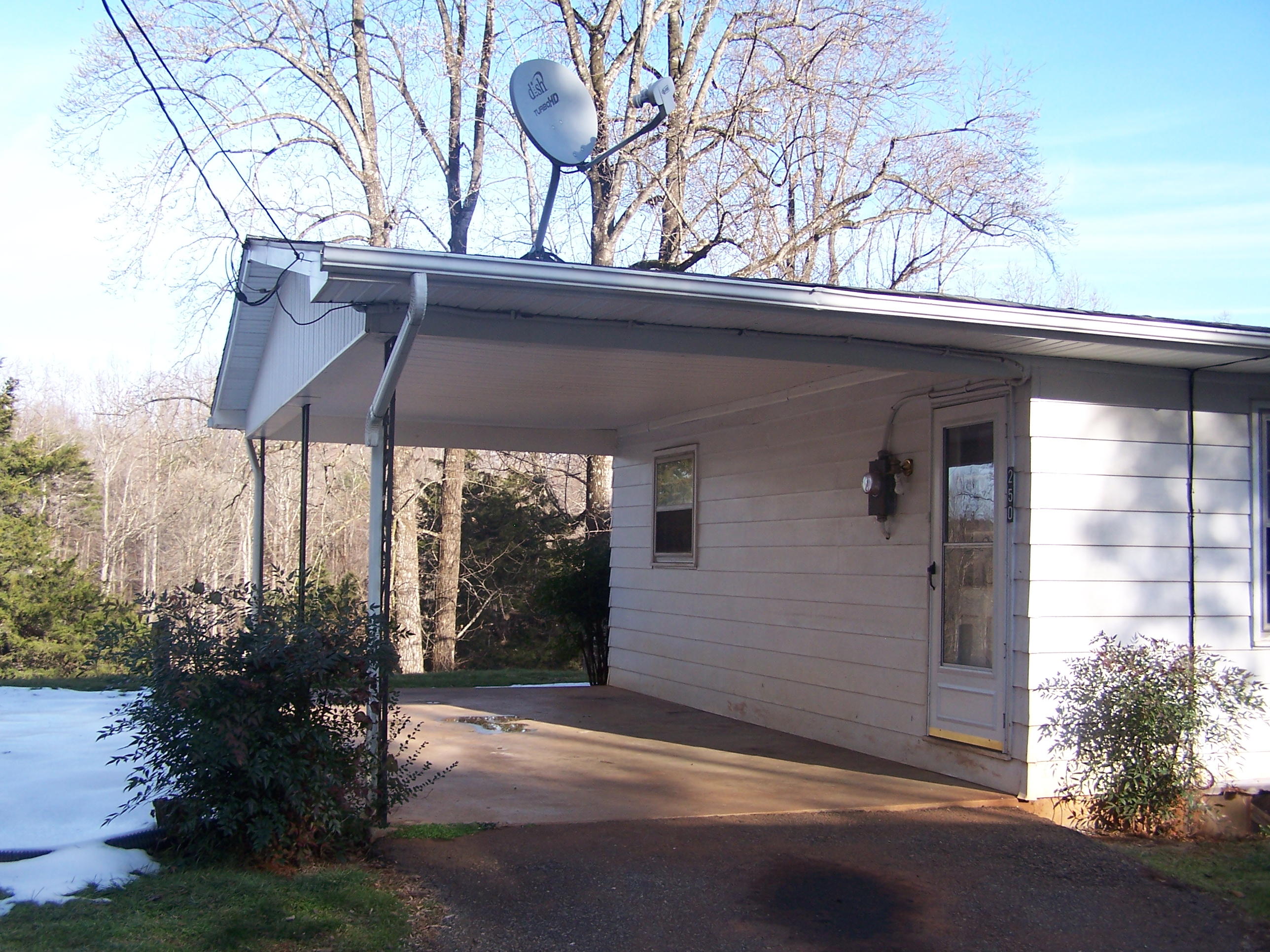 250 Muse Field Road Rocky Mount, VA 24151 - Photo 10 of 23 a backyard of a house with plants and outdoor seating
