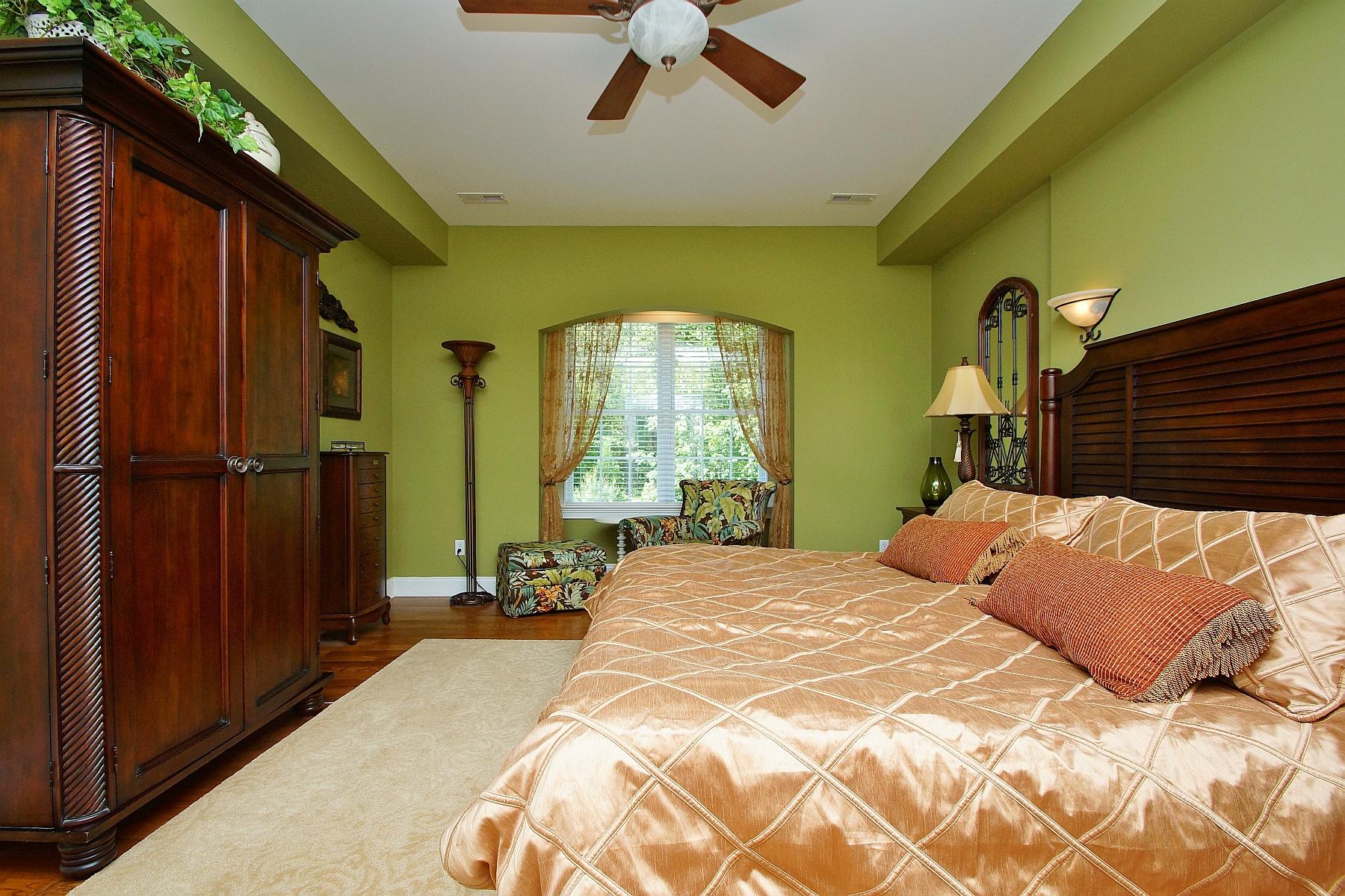 12979 Hardy Road Hardy, VA 24101 - Photo 14 of 36 a bedroom with a bed and a chandelier