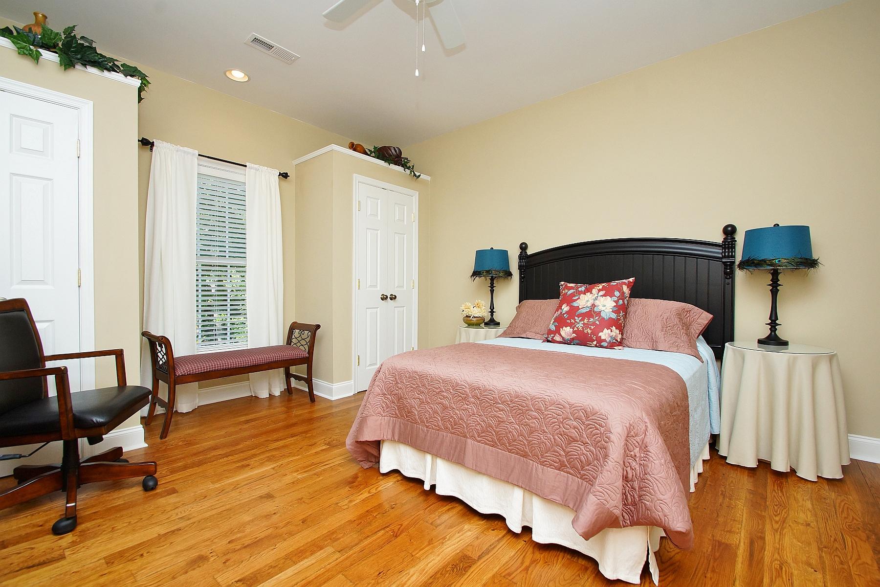 12979 Hardy Road Hardy, VA 24101 - Photo 17 of 36 a bedroom with a bed and a chair