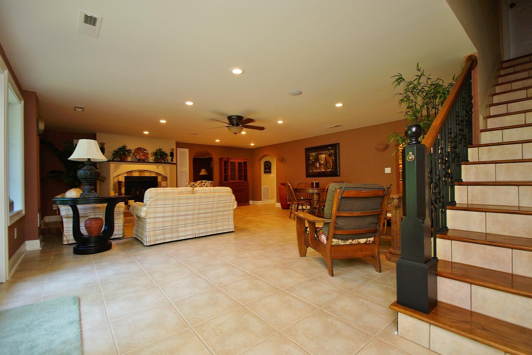 12979 Hardy Road Hardy, VA 24101 - Photo 18 of 36 a living room with furniture gym equipment and a ceiling fan