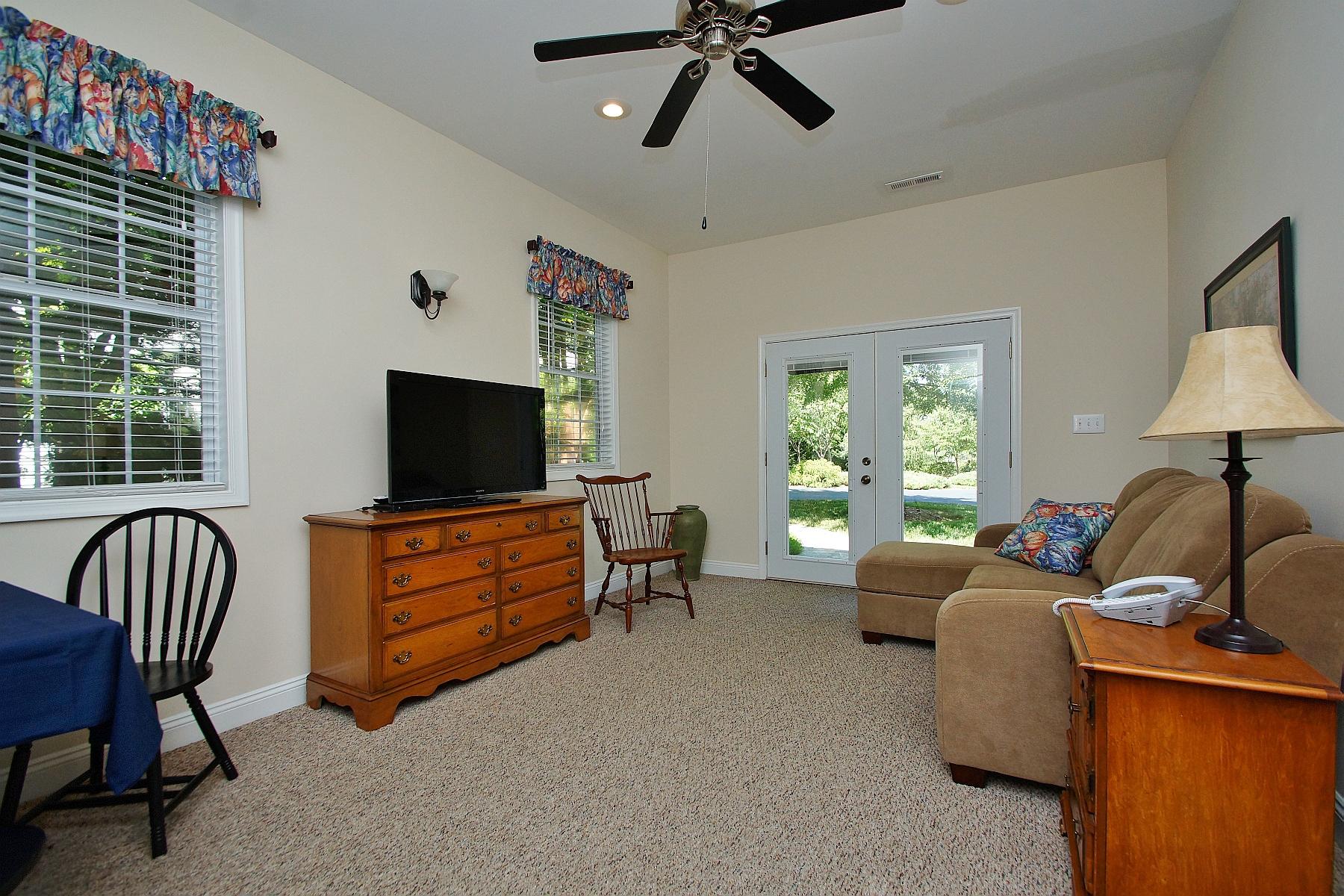 12979 Hardy Road Hardy, VA 24101 - Photo 30 of 36 a living room with furniture and a flat screen tv