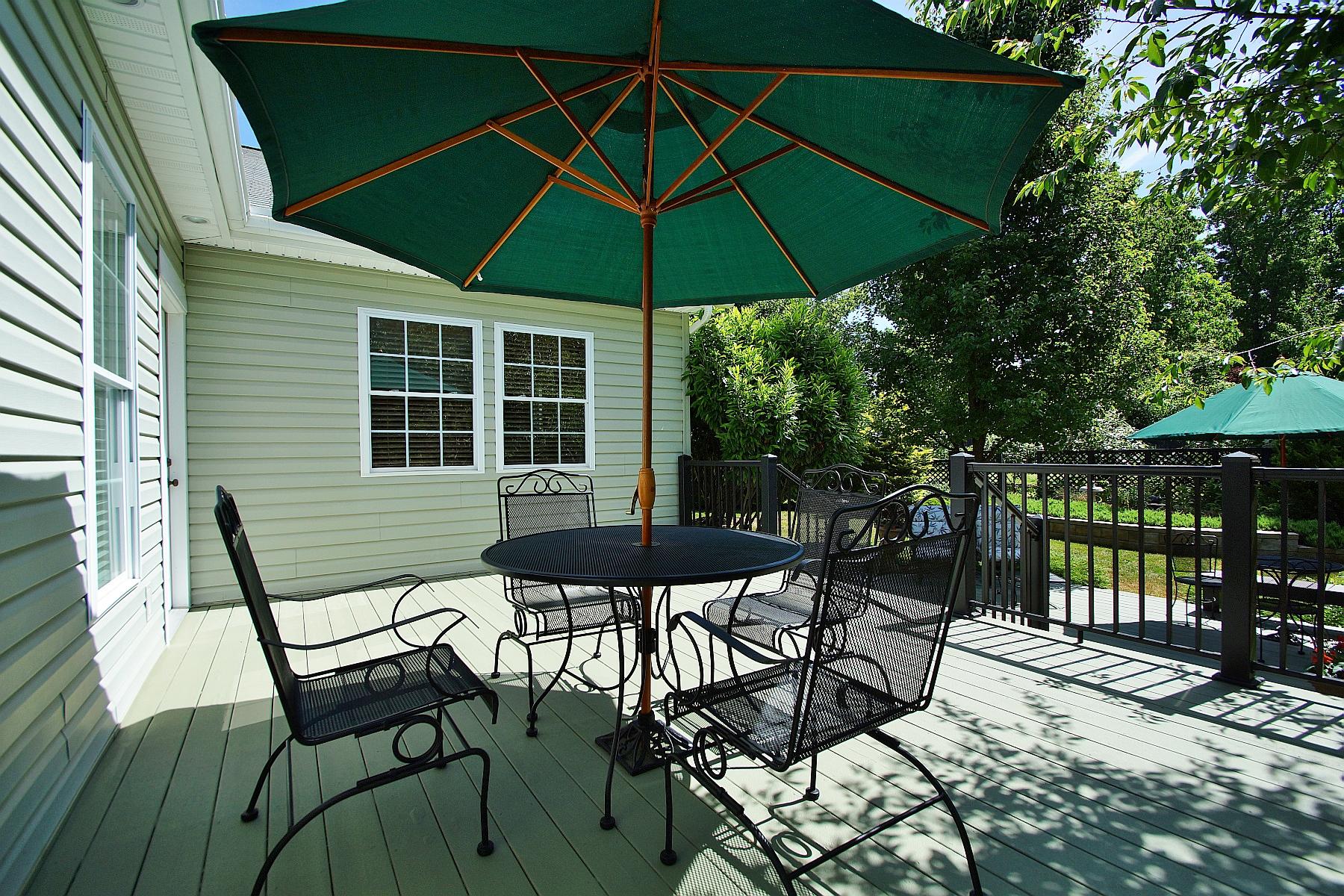 12979 Hardy Road Hardy, VA 24101 - Photo 33 of 36 a patio with a patio table and chairs