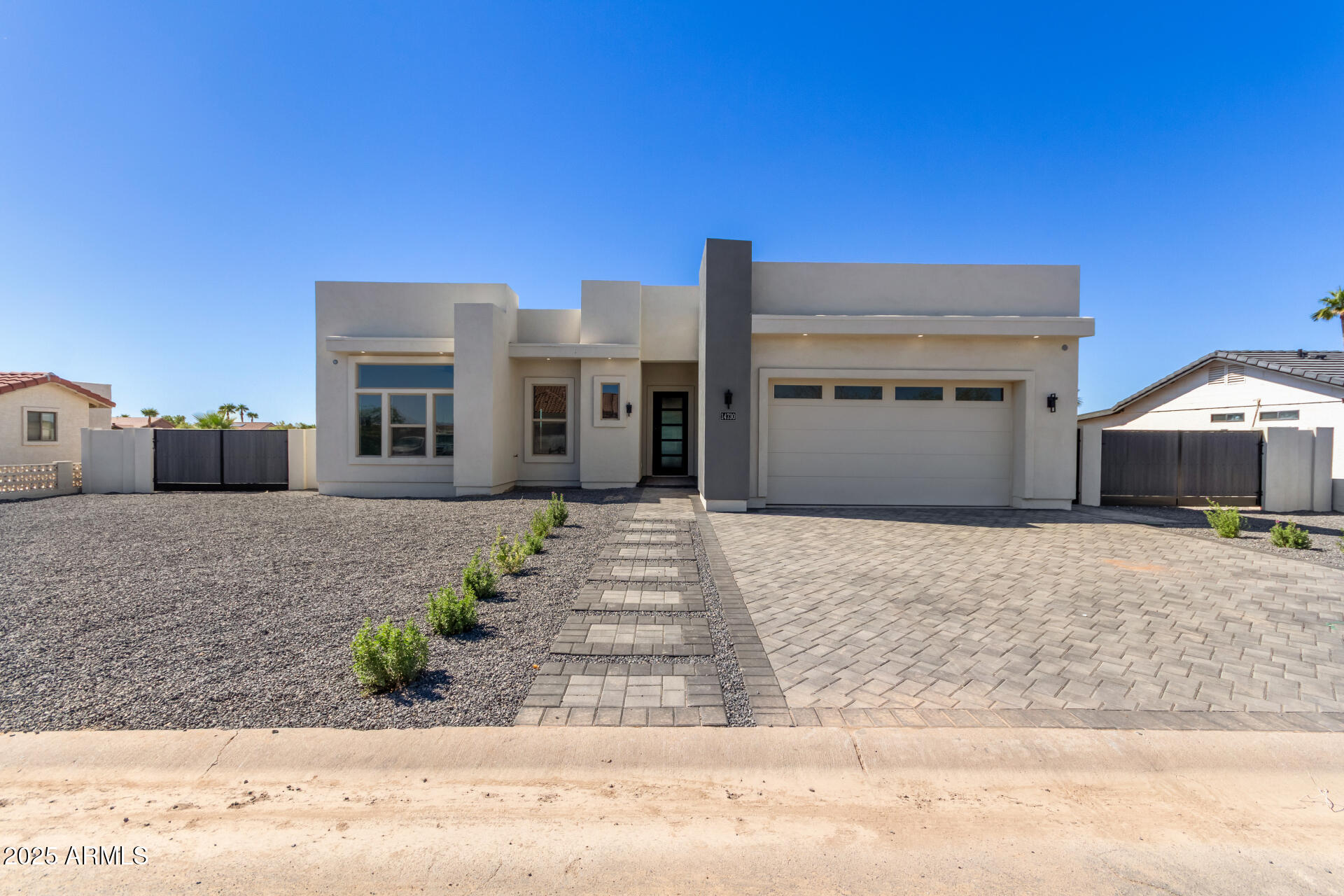 14730 South Rory Calhoun Road Arizona City, AZ 85123 - Photo 1 of 43 a front view of a house with a yard