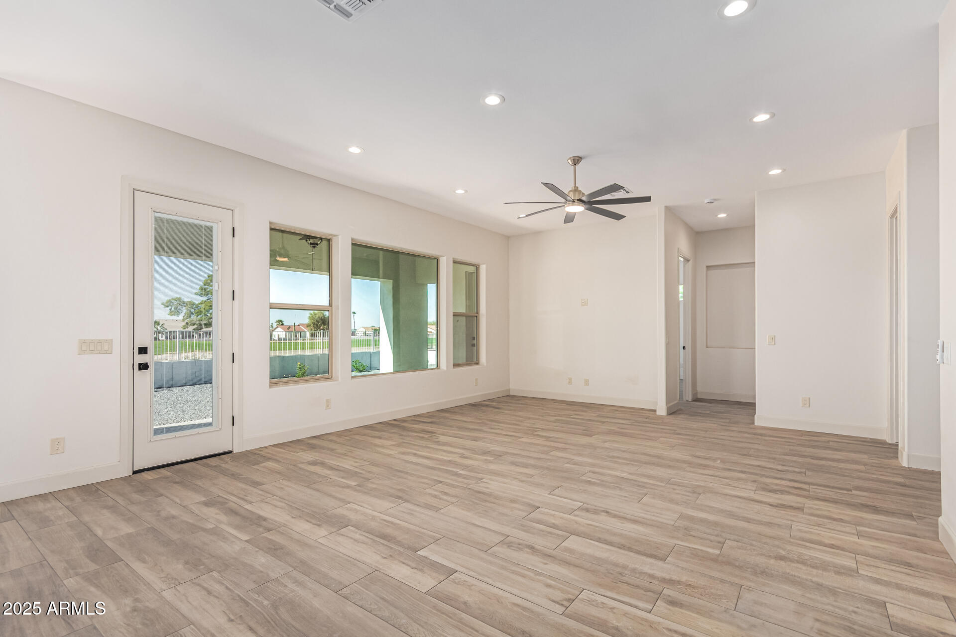 14730 South Rory Calhoun Road Arizona City, AZ 85123 - Photo 11 of 43 a view of an empty room with a window