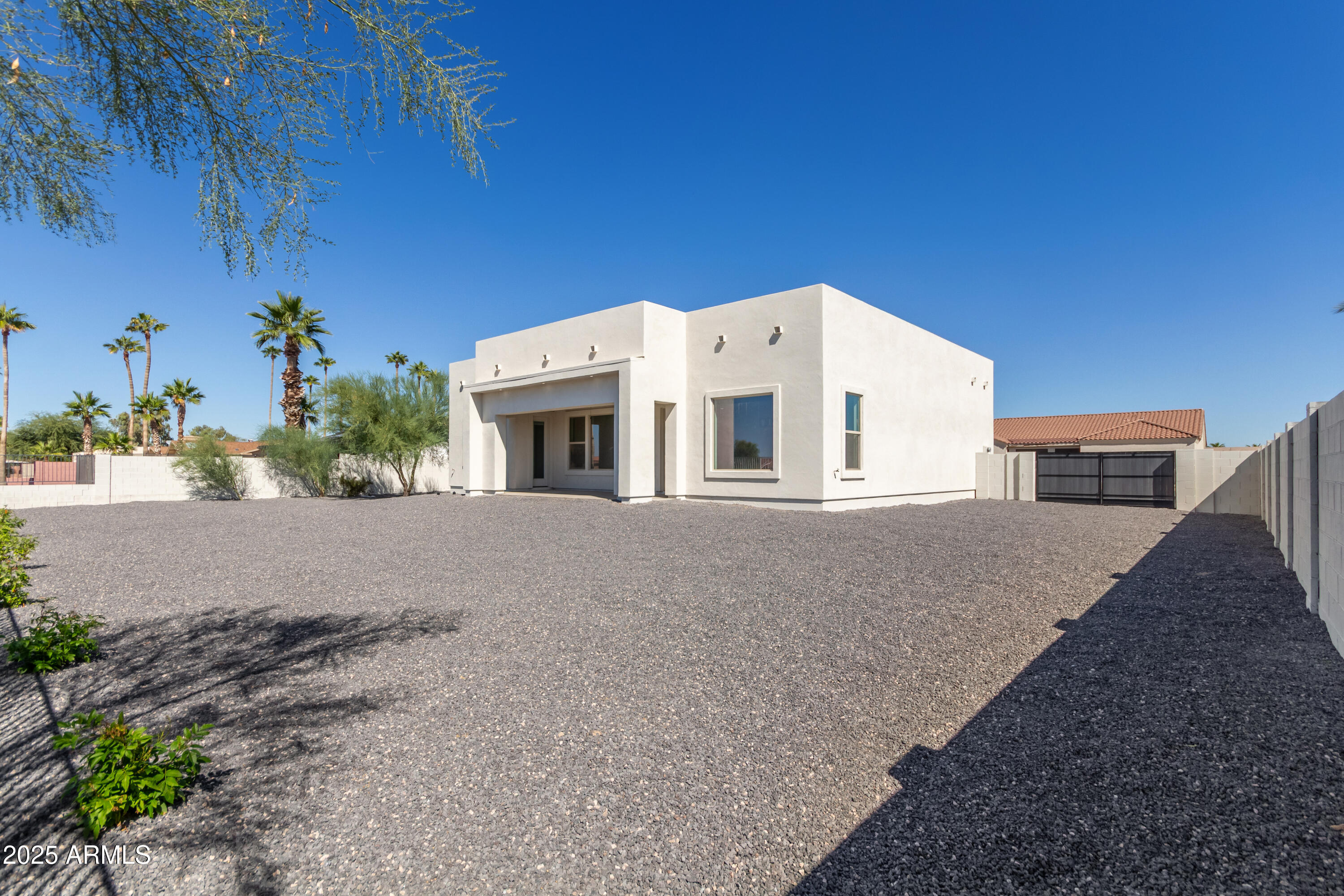 14730 South Rory Calhoun Road Arizona City, AZ 85123 - Photo 30 of 43 a front view of a house with a yard