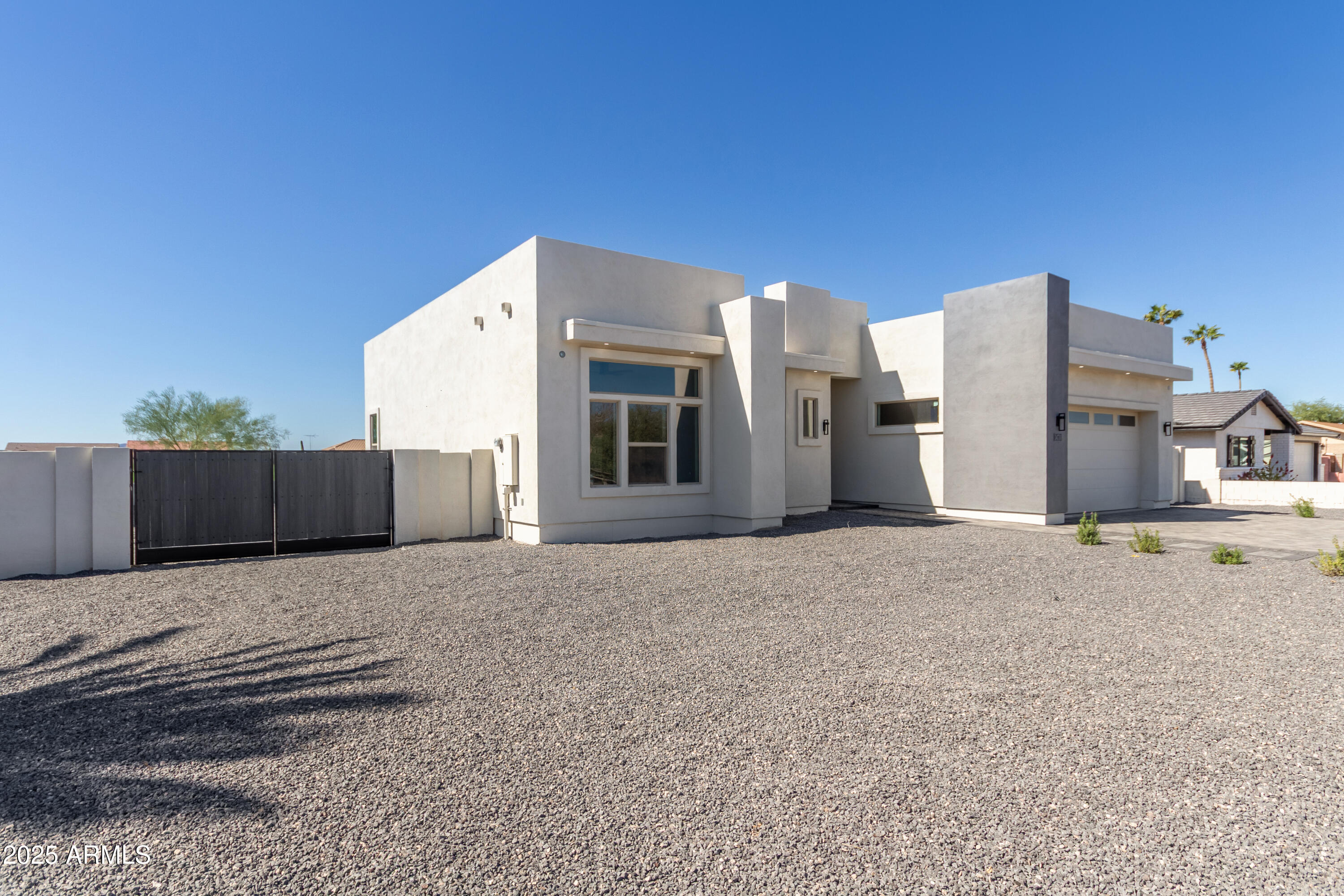 14730 South Rory Calhoun Road Arizona City, AZ 85123 - Photo 3 of 43 a backyard of a house