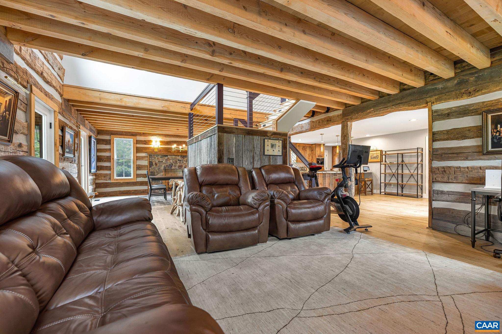 5620 Blenheim Road Charlottesville, VA 22902 - Photo 19 of 59 a living room with furniture and a ceiling fan