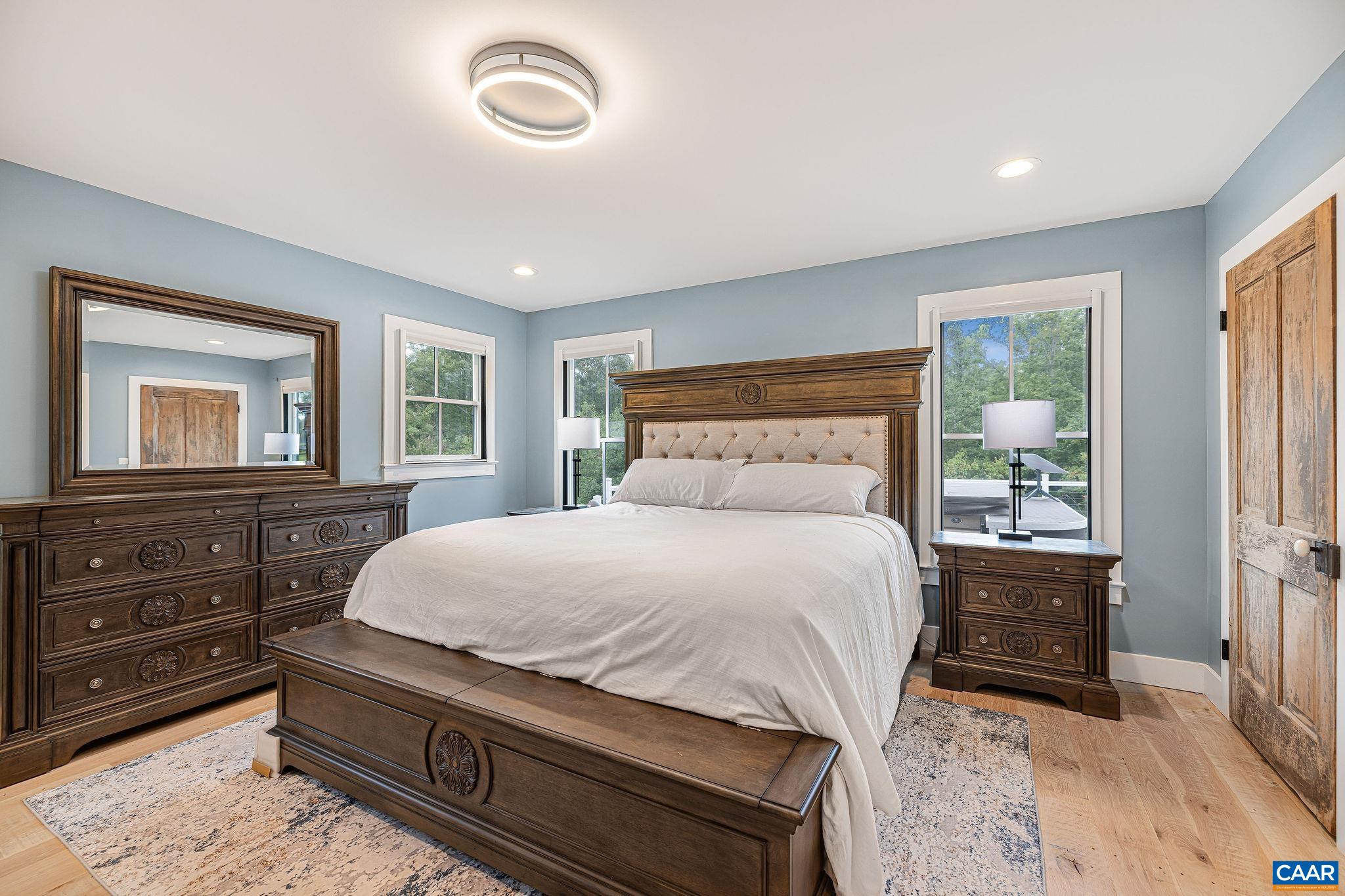 5620 Blenheim Road Charlottesville, VA 22902 - Photo 20 of 59 a bedroom with a bed and a dresser