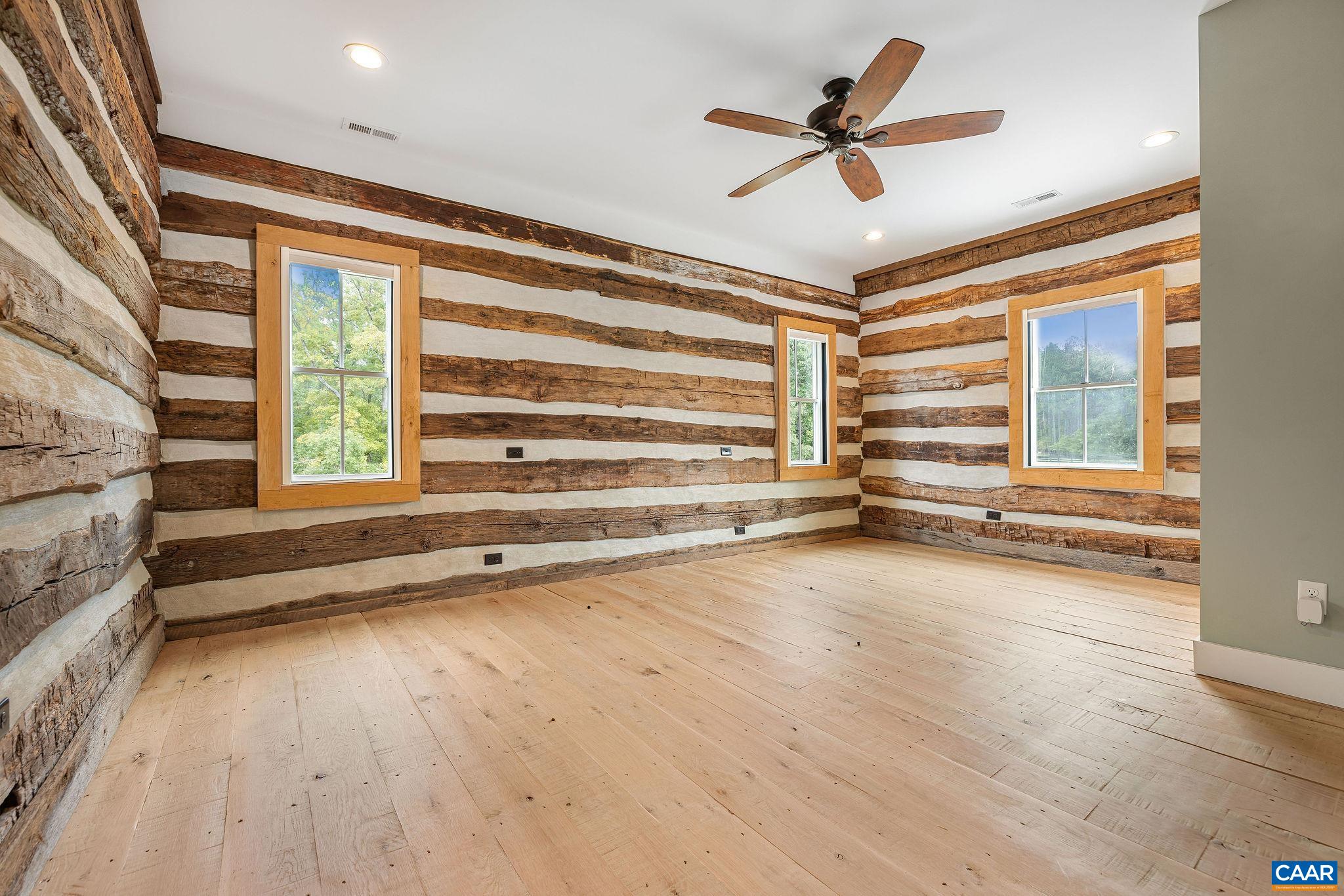 5620 Blenheim Road Charlottesville, VA 22902 - Photo 29 of 59 wooden floor in an empty room with a window