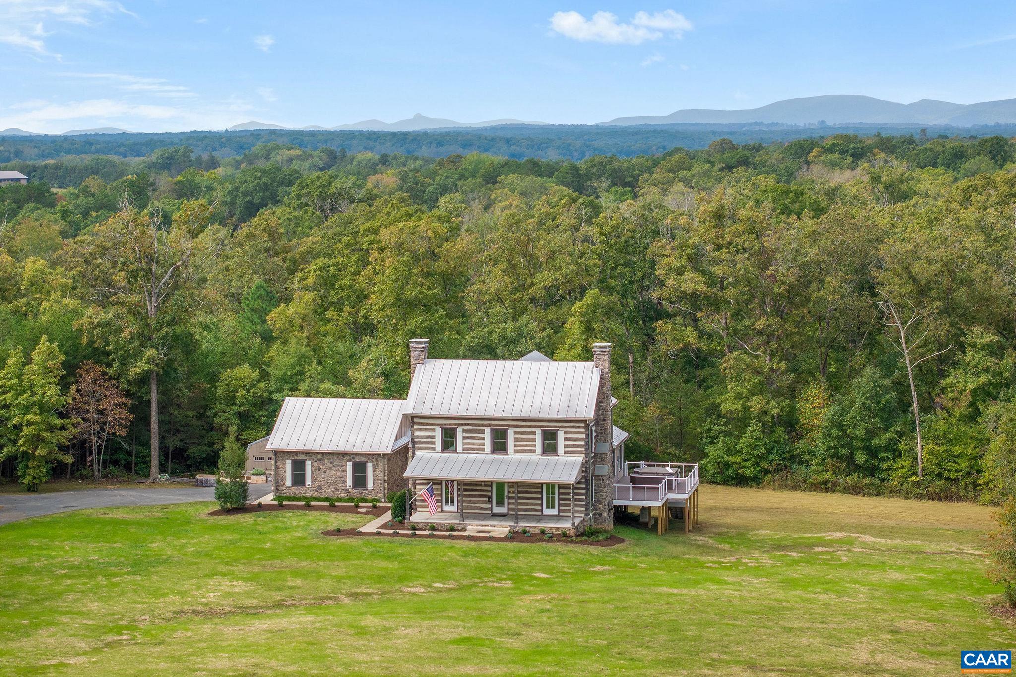5620 Blenheim Road Charlottesville, VA 22902 - Photo 3 of 59 a view of a terrace with a garden