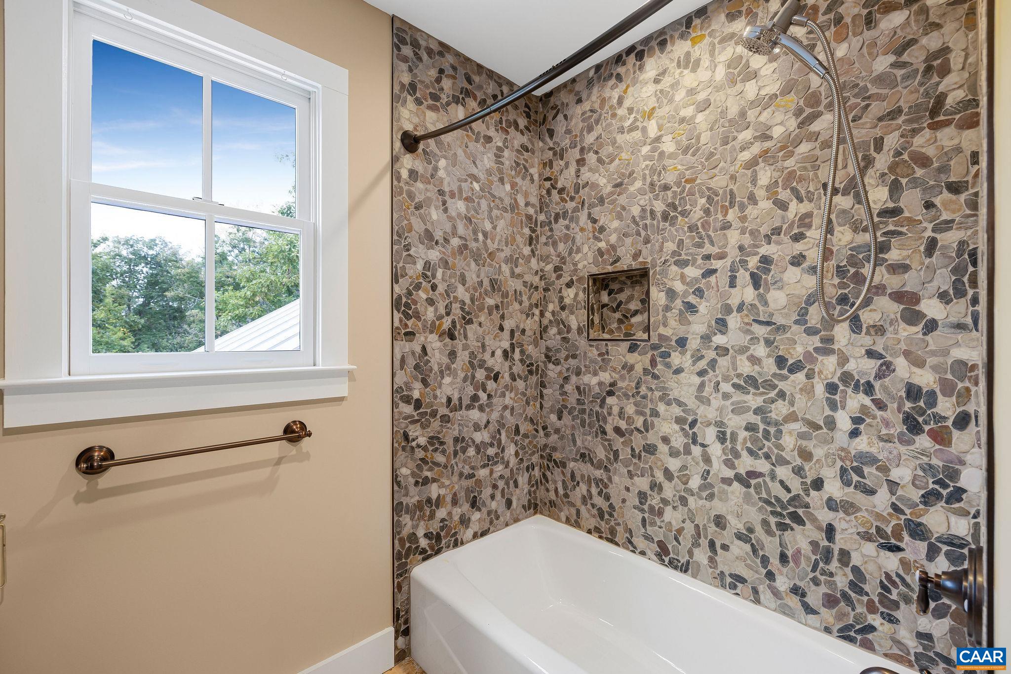 5620 Blenheim Road Charlottesville, VA 22902 - Photo 34 of 59 a bathroom with a toilet and a shower curtain