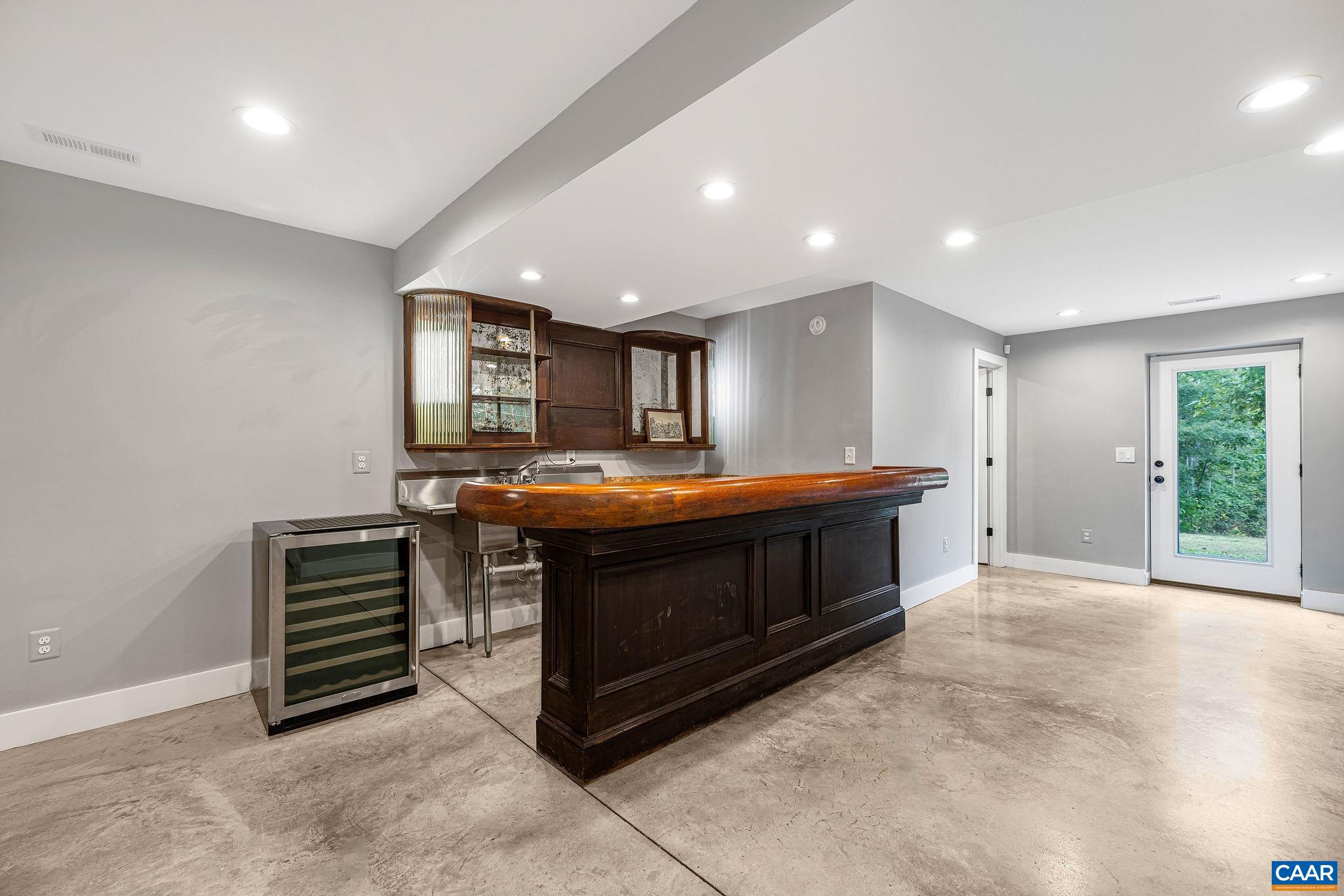 5620 Blenheim Road Charlottesville, VA 22902 - Photo 40 of 59 a room with furniture and a ceiling fan