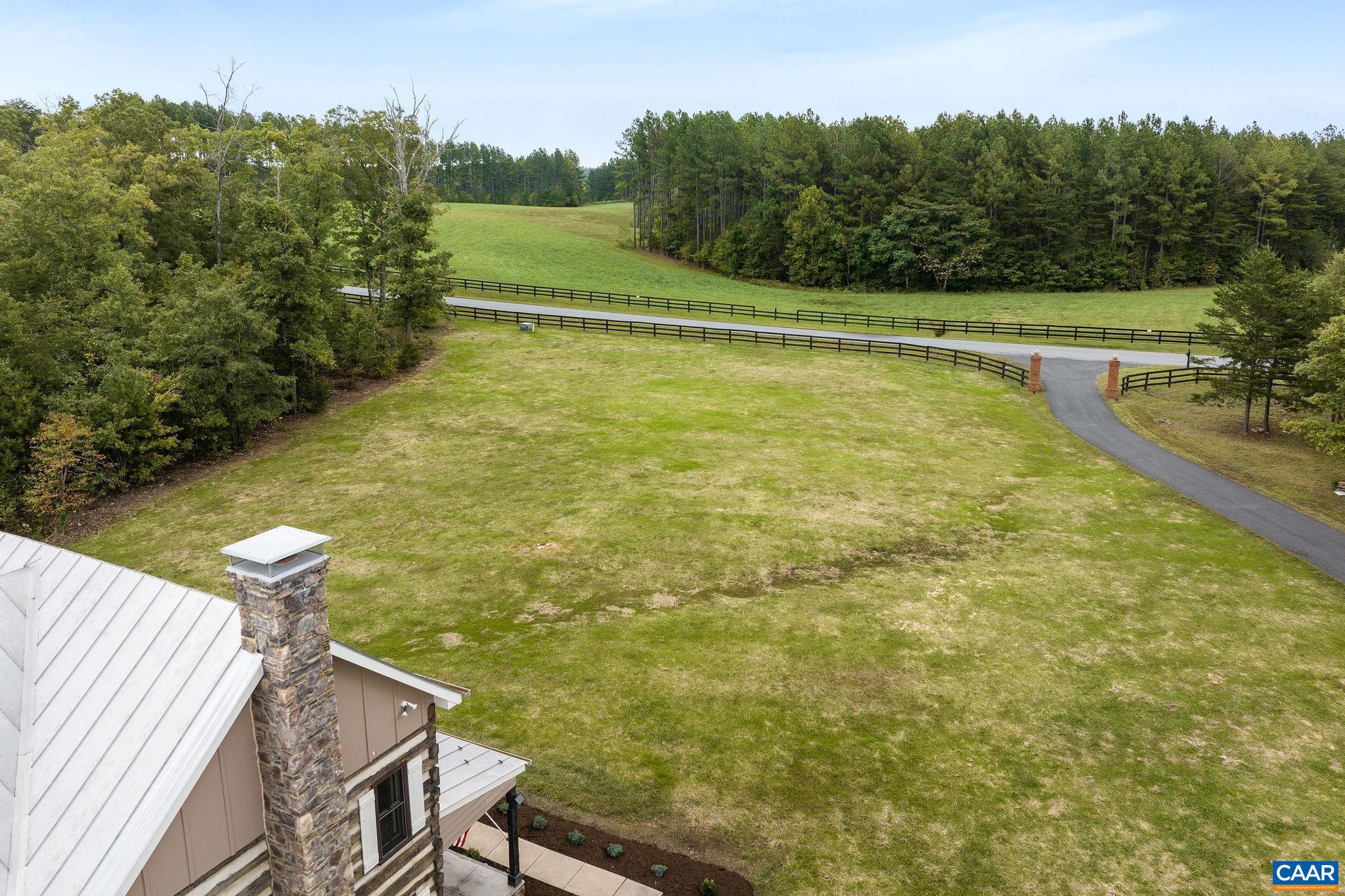 5620 Blenheim Road Charlottesville, VA 22902 - Photo 4 of 59 a view of a swimming pool with a yard