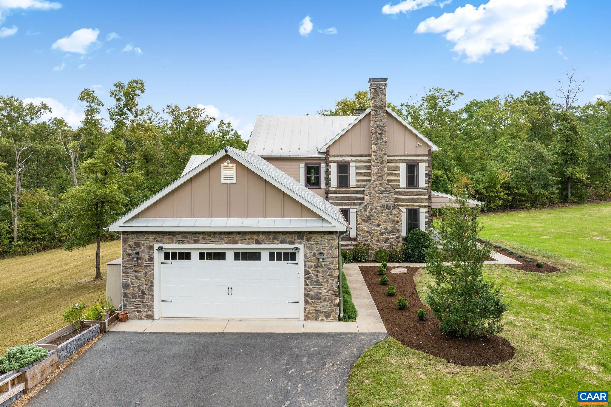 5620 Blenheim Road Charlottesville, VA 22902 - Photo 46 of 59 a view of a house with a yard