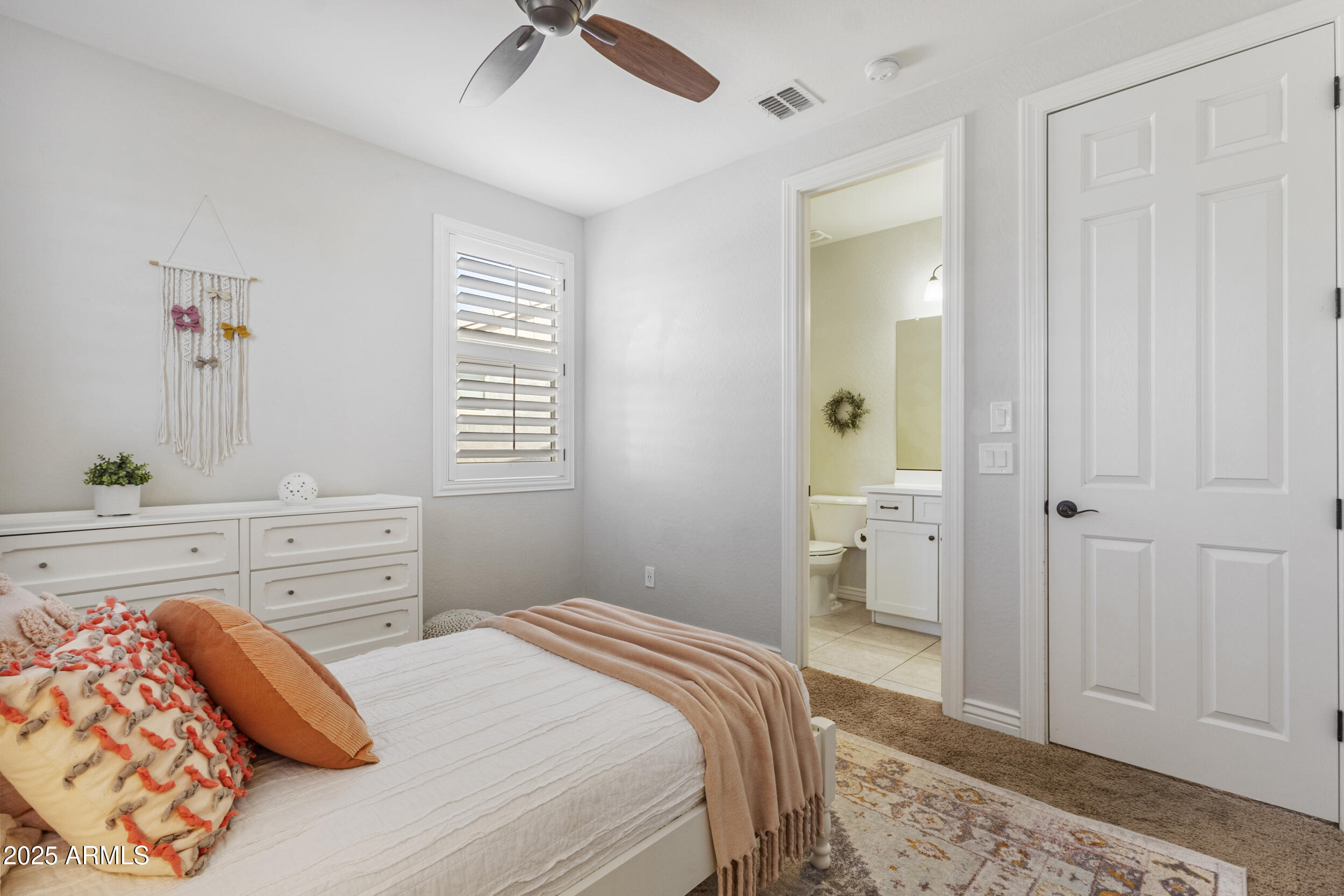 4292 East Morrison Ranch Parkway Gilbert, AZ 85296 - Photo 39 of 55 a bedroom with a bed and a dresser